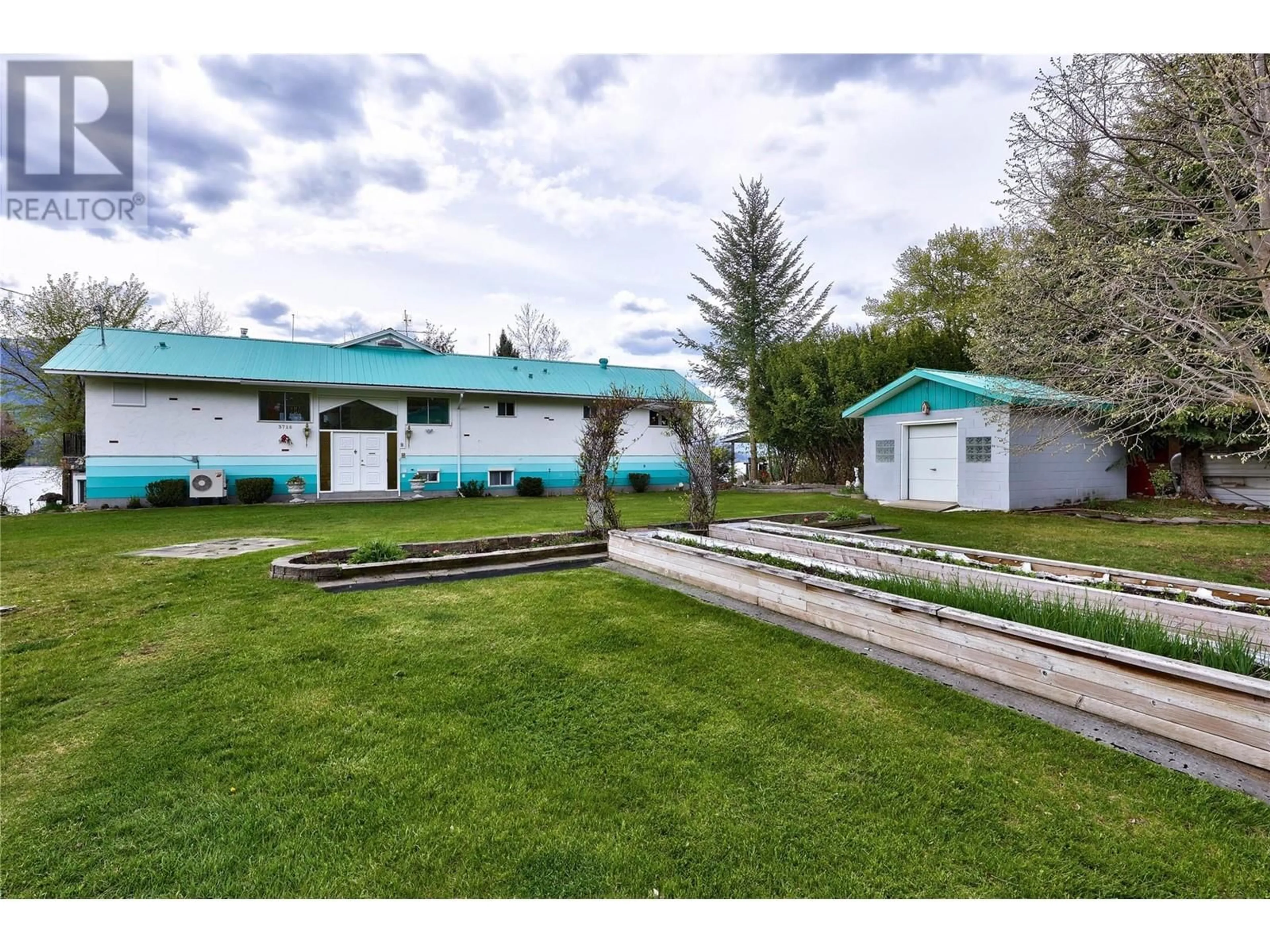 A pic from outside/outdoor area/front of a property/back of a property/a pic from drone, mountain view for 3726 ZINCK ROAD, Scotch Creek British Columbia V0E1M5