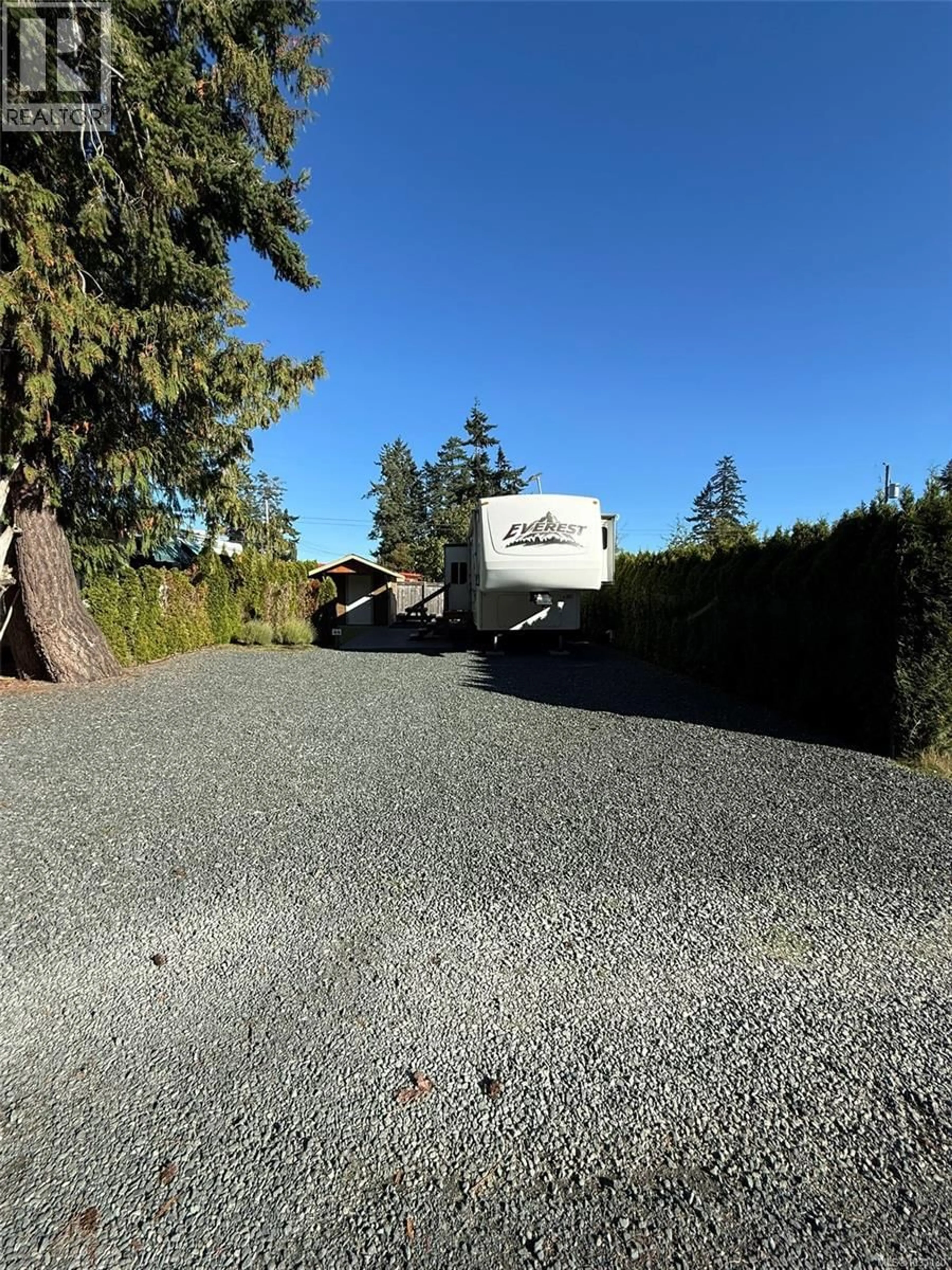 A pic from outside/outdoor area/front of a property/back of a property/a pic from drone, street for 44 - 6050 ISLAND HIGHWAY, Qualicum Beach British Columbia V9K2E1