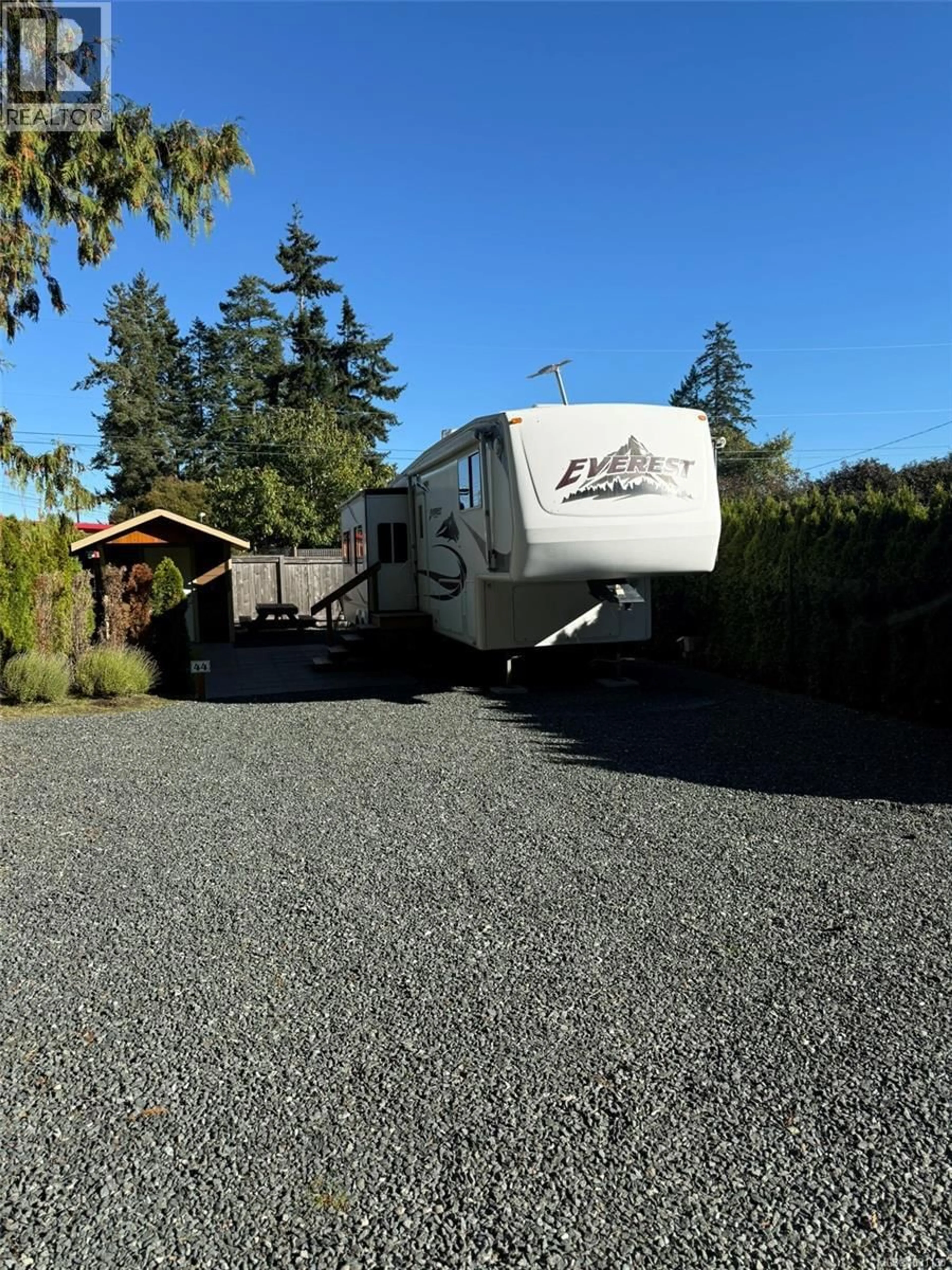 A pic from outside/outdoor area/front of a property/back of a property/a pic from drone, street for 44 - 6050 ISLAND HIGHWAY, Qualicum Beach British Columbia V9K2E1