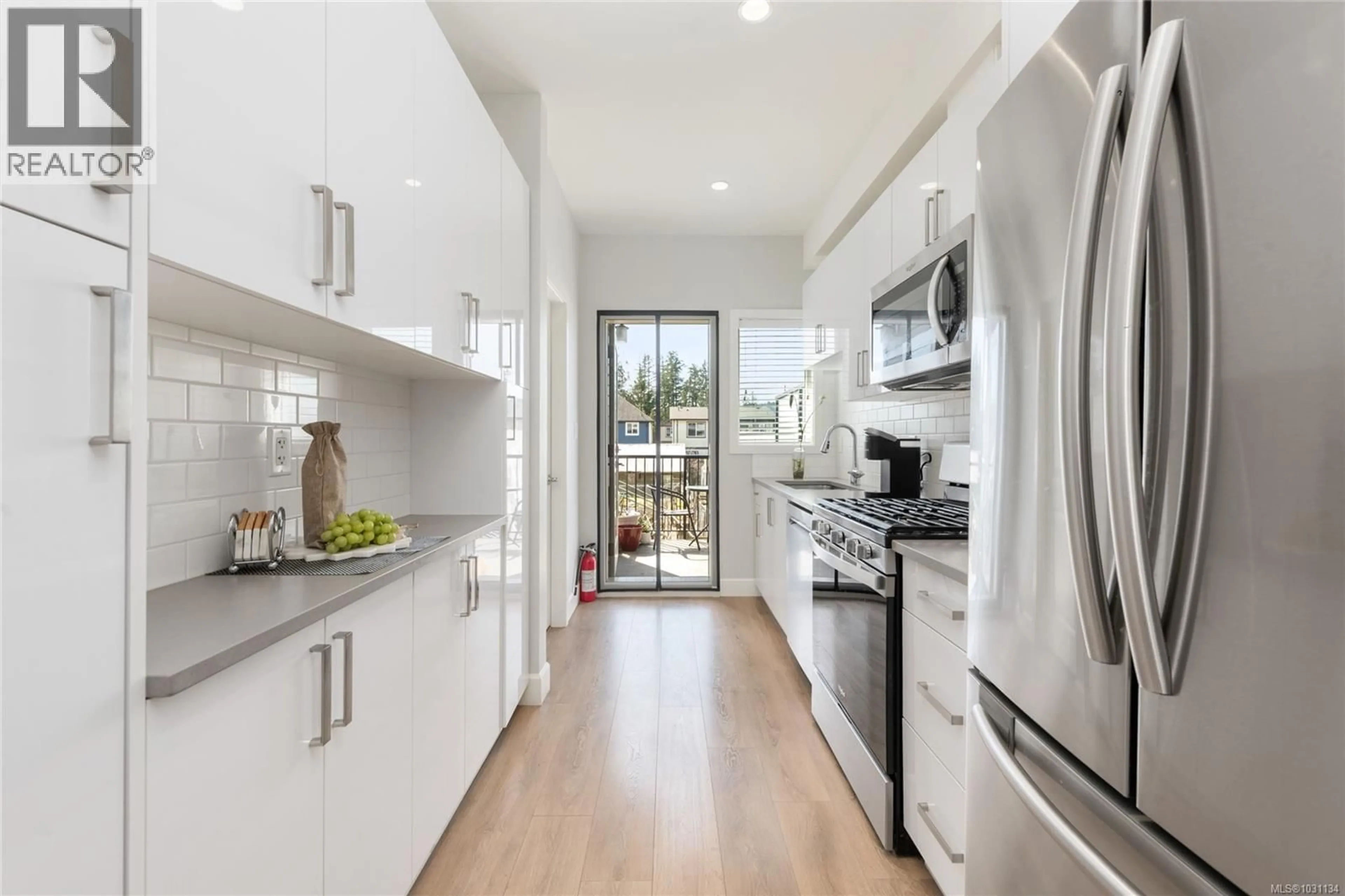 Contemporary kitchen, ceramic/tile floor for 405 - 3351 LUXTON ROAD, Langford British Columbia V9C0P2