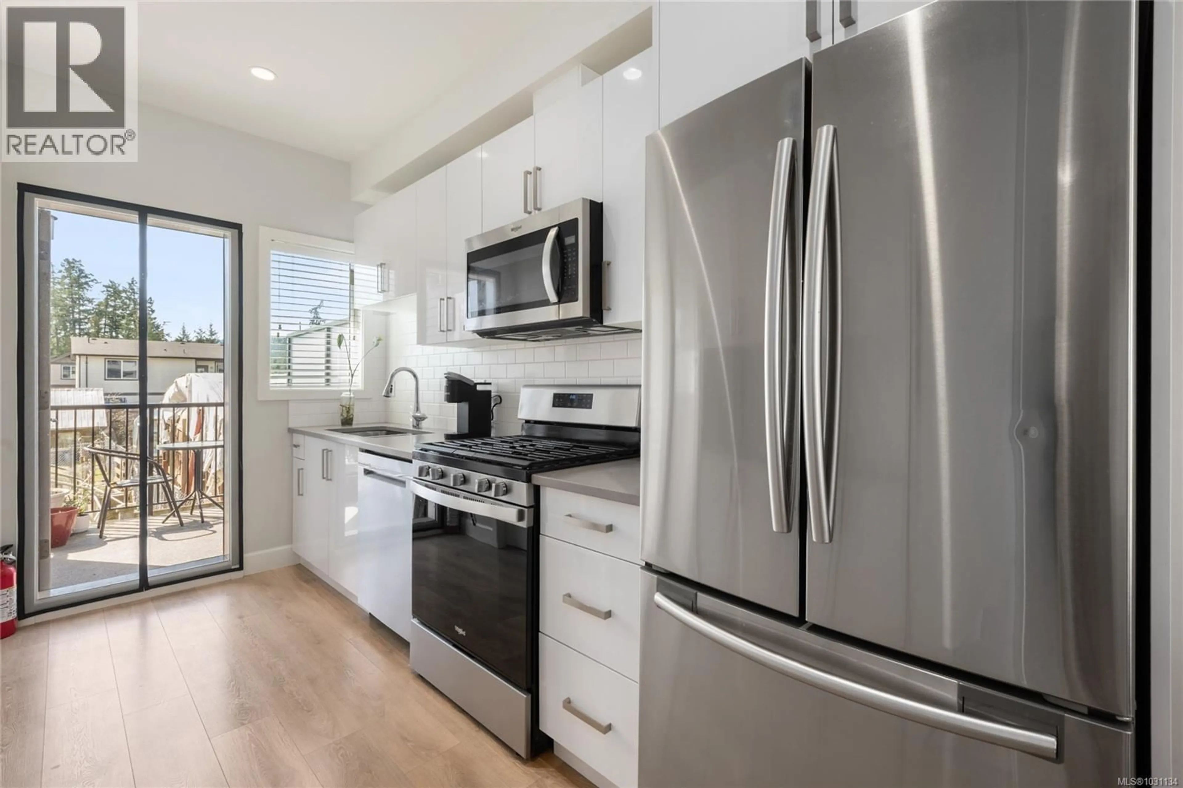 Open concept kitchen, ceramic/tile floor for 405 - 3351 LUXTON ROAD, Langford British Columbia V9C0P2