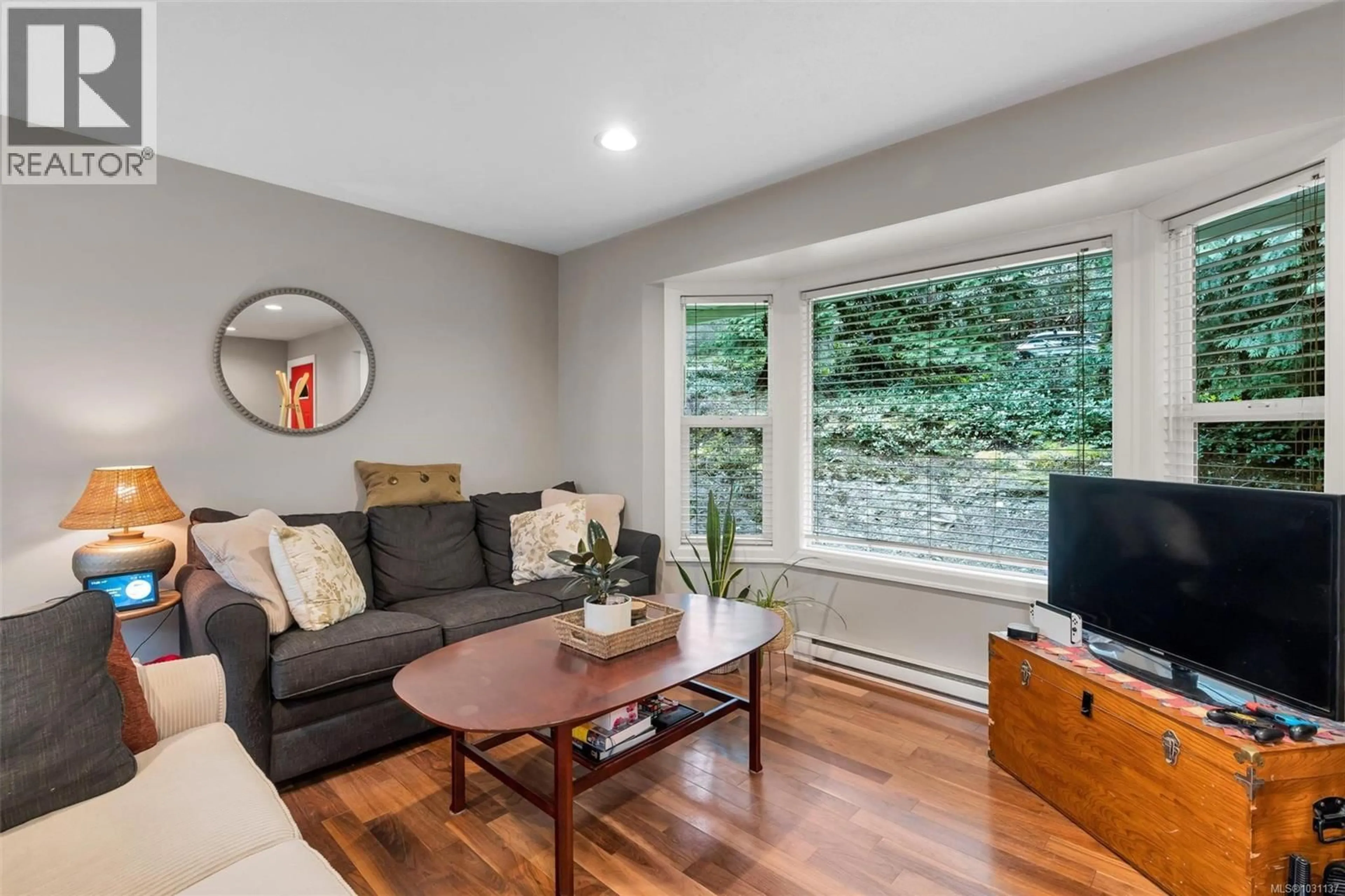 Living room with furniture, wood/laminate floor for 5308 ROCKY POINT ROAD, Metchosin British Columbia V9C4G7