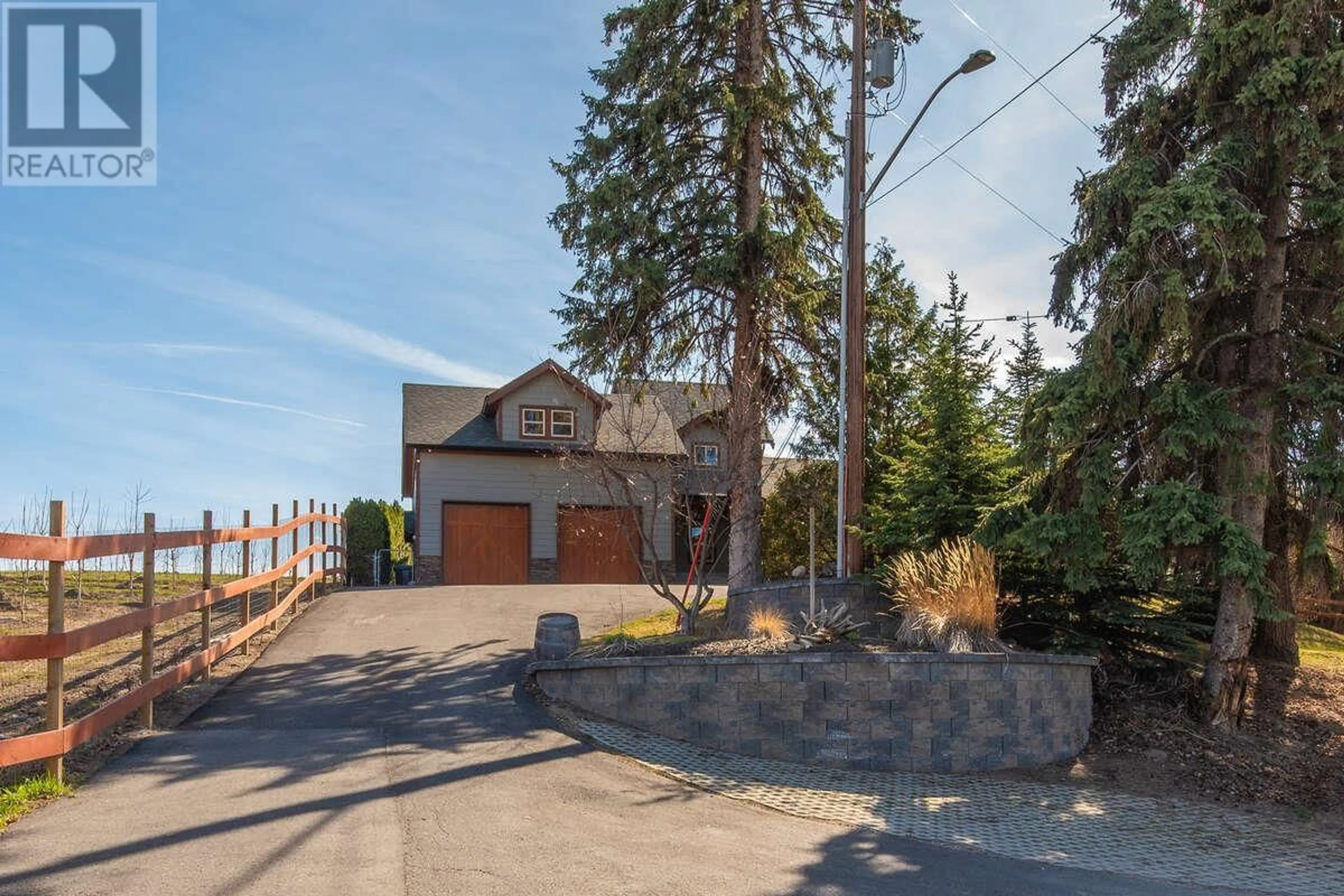 Frontside or backside of a home for 1298 Belgo Road, Kelowna British Columbia V1P1C7