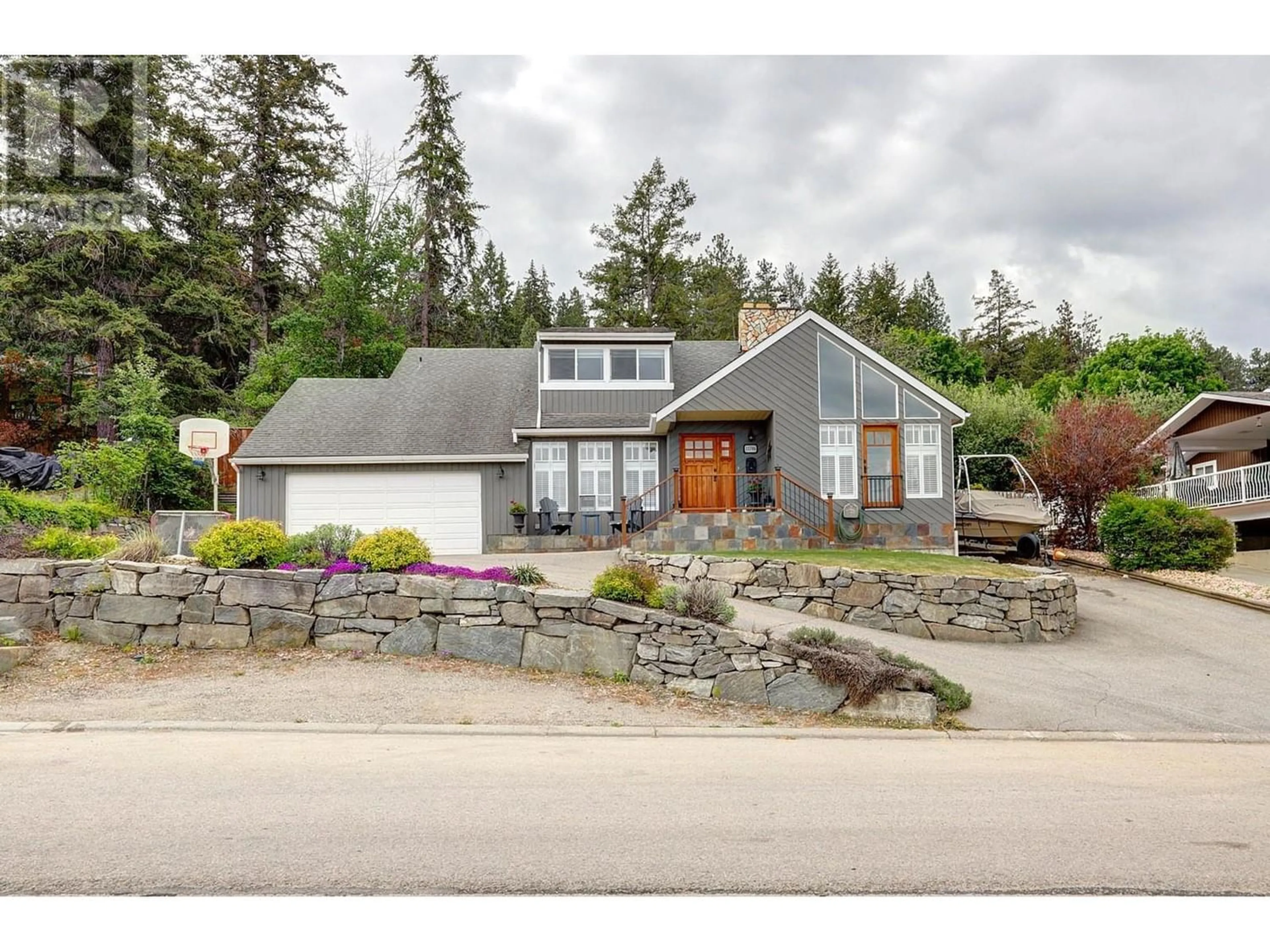Frontside or backside of a home for 11704 Palfrey Drive W, Coldstream British Columbia V1B1A8