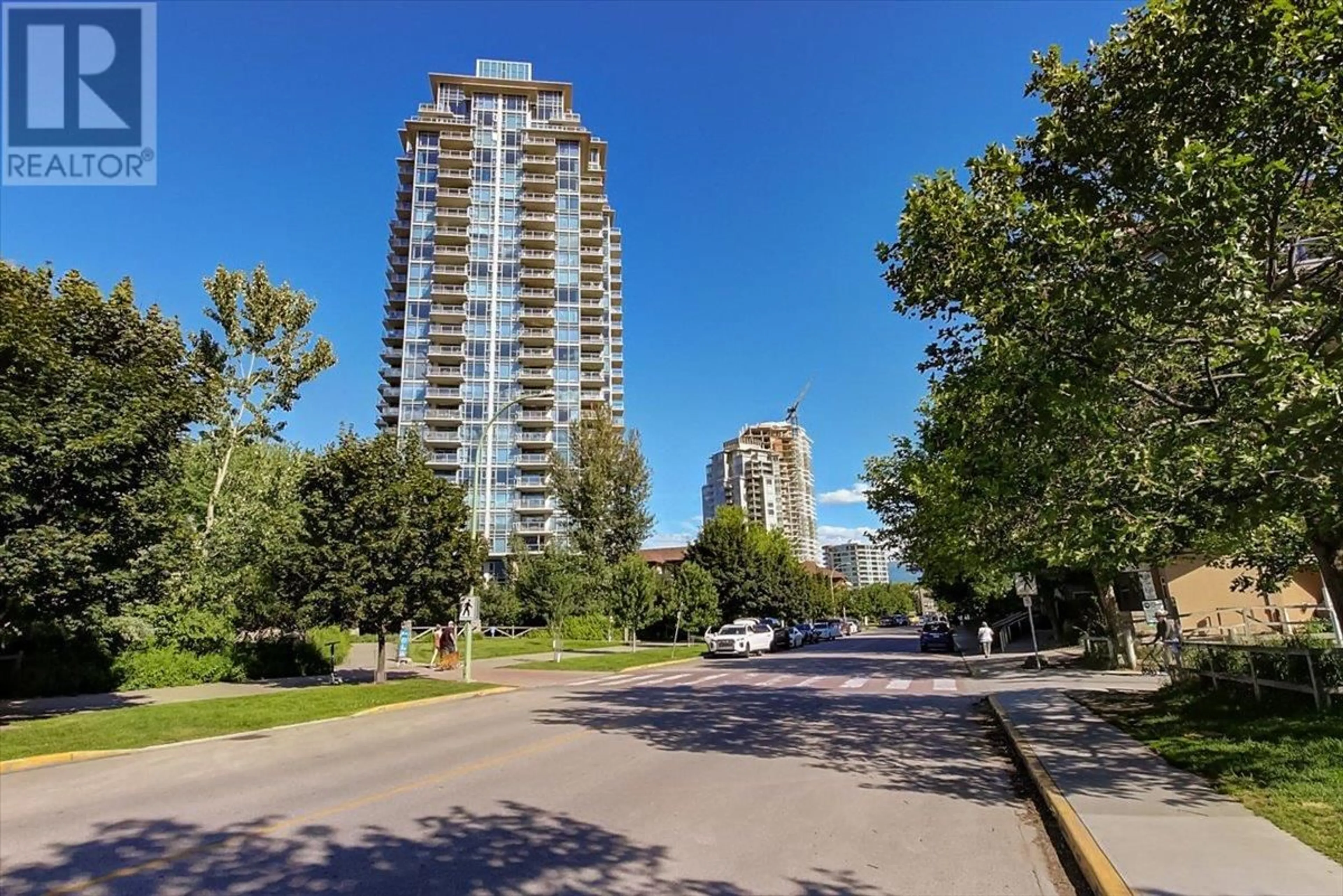 A pic from exterior of the house or condo, the street view for 1075 Sunset Drive Unit# 2003, Kelowna British Columbia V1Y9Y9