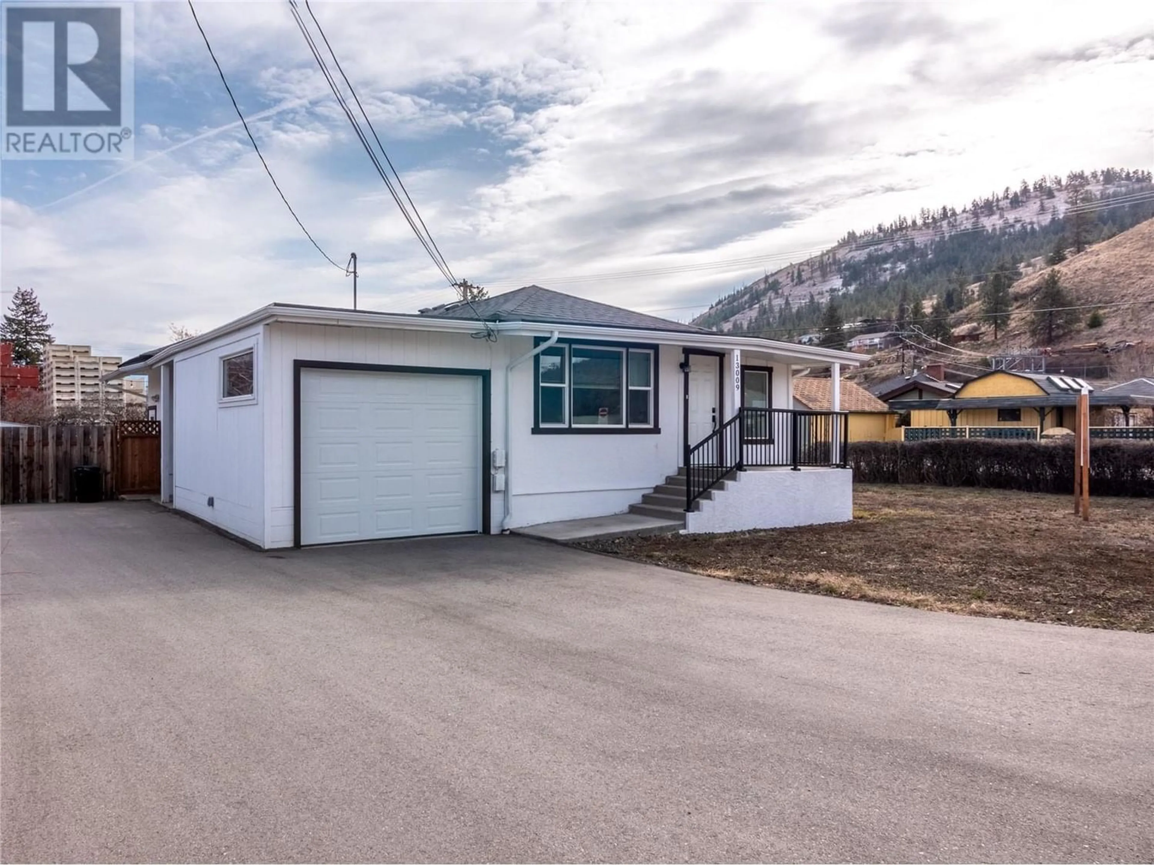 Frontside or backside of a home for 13009 Armstrong Avenue, Summerland British Columbia V0H1Z0