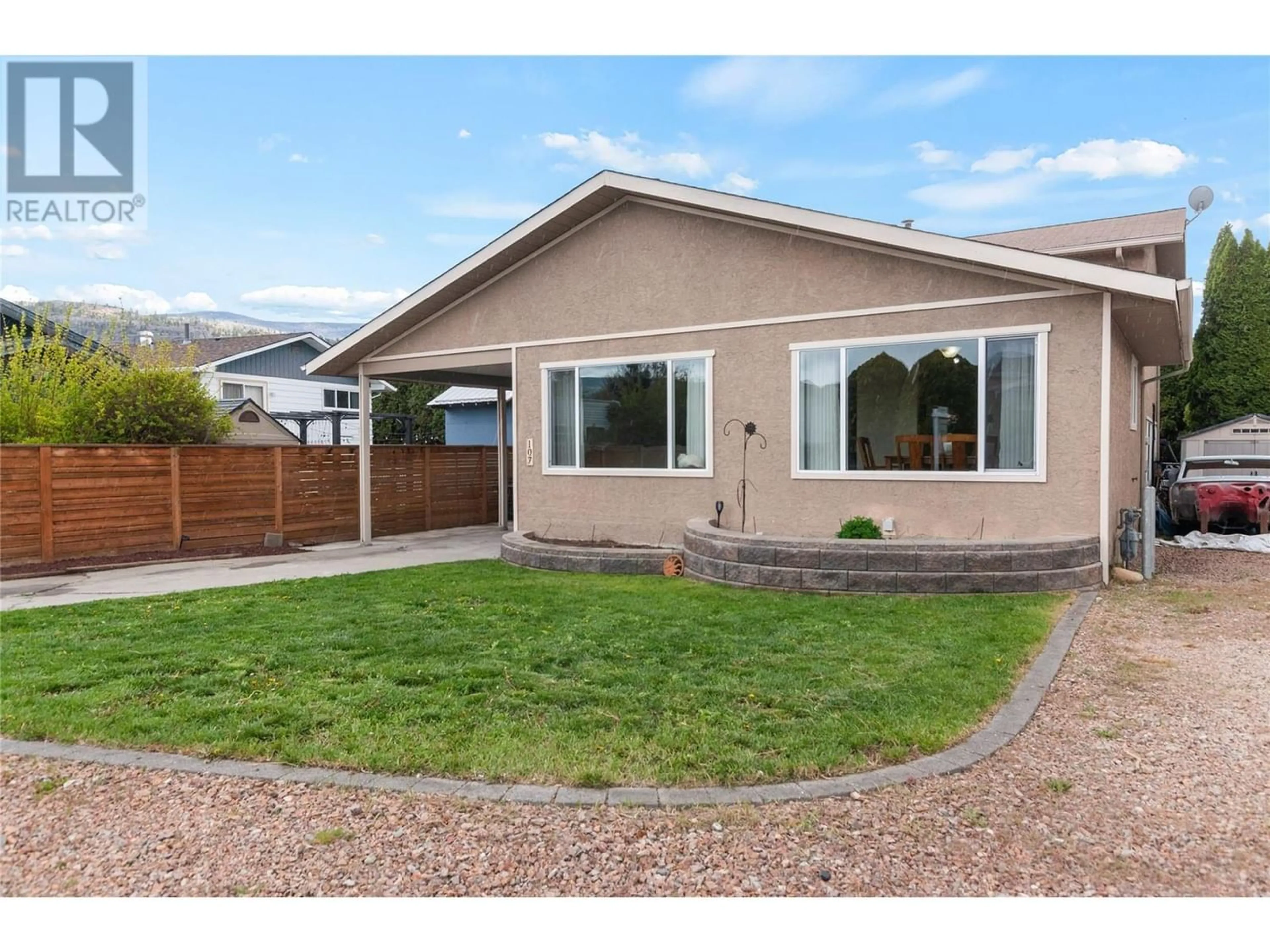 Frontside or backside of a home for 107 Blairmore Crescent, Penticton British Columbia V2A7C5