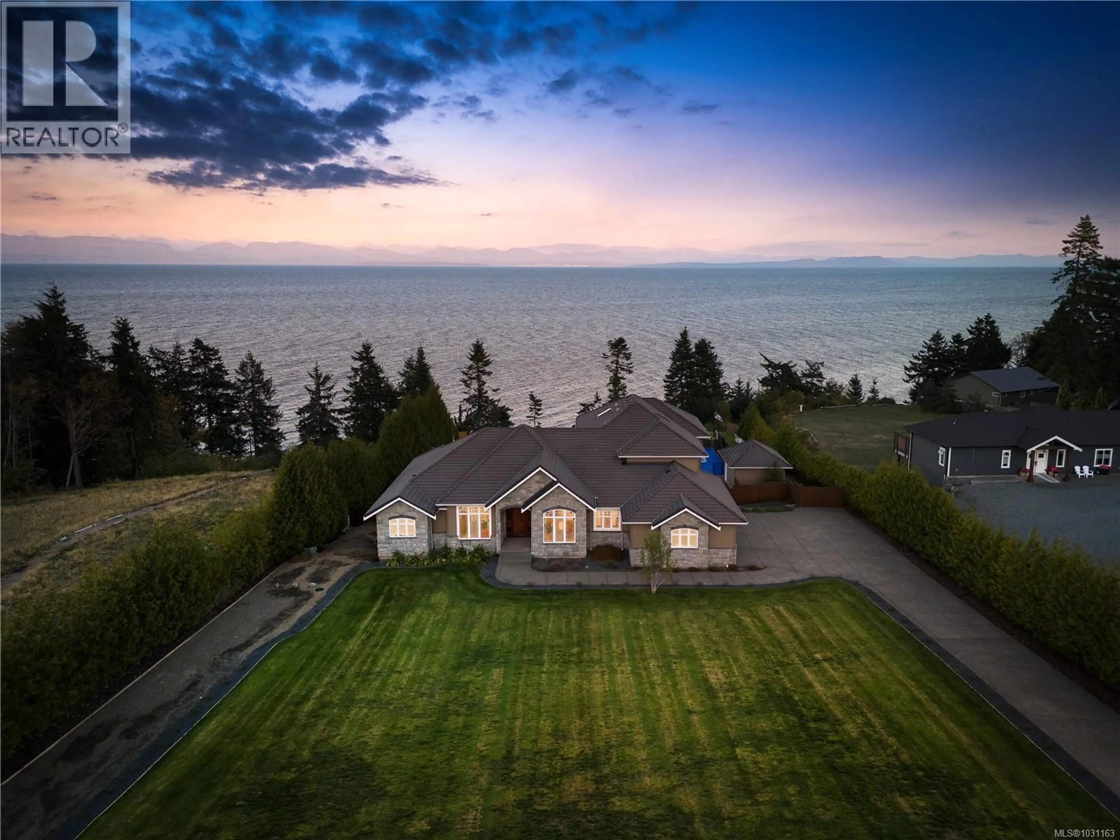 A pic from outside/outdoor area/front of a property/back of a property/a pic from drone, water/lake/river/ocean view for 6480 EAGLES DRIVE, Courtenay British Columbia V9J1V3