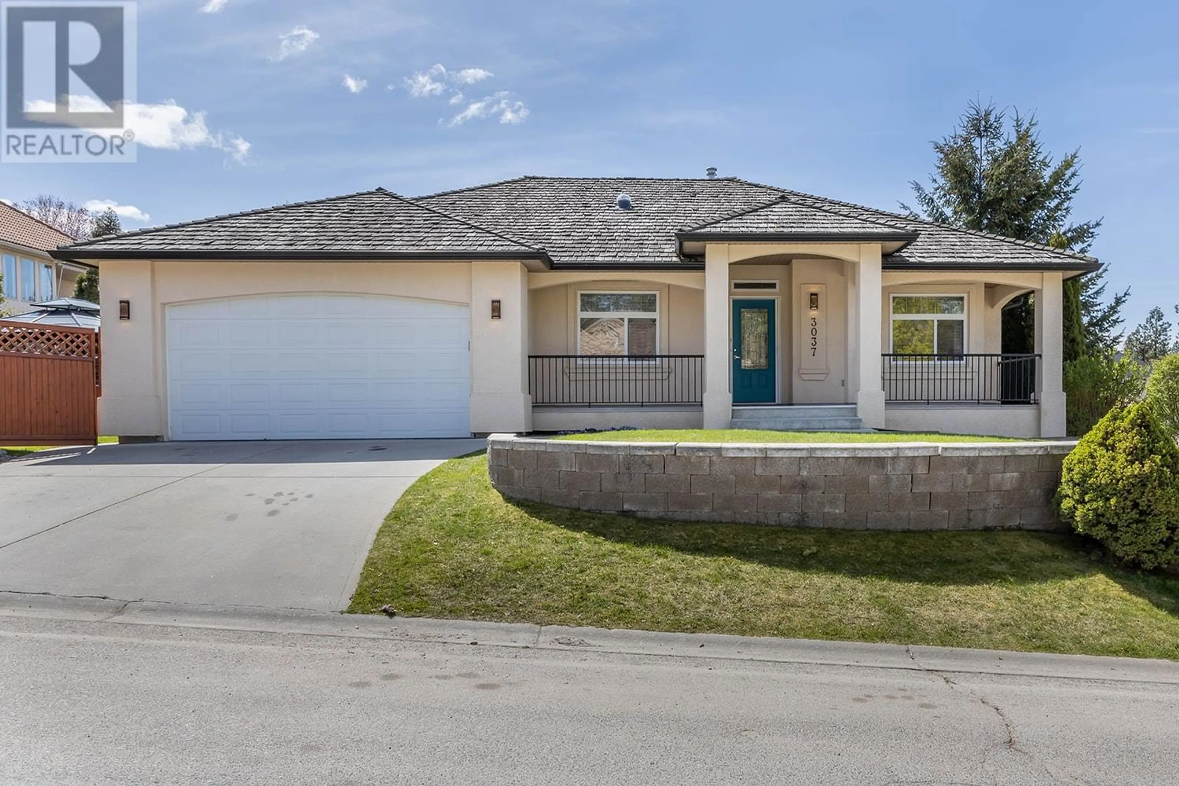 Frontside or backside of a home for 3037 Quail Crescent, Kelowna British Columbia V1V1Z9