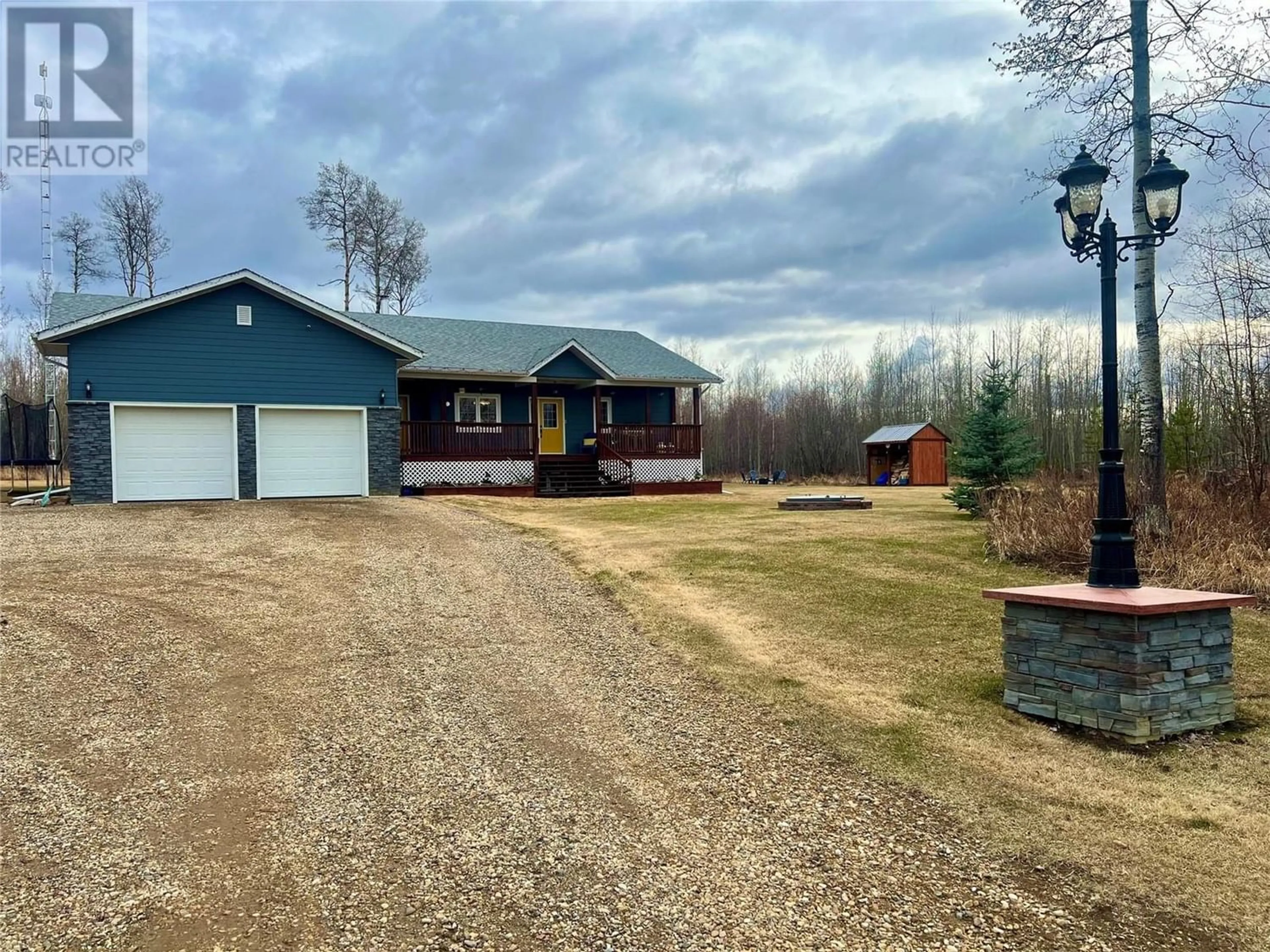 Frontside or backside of a home for 10119 235 Road, Dawson Creek British Columbia V1G4E7