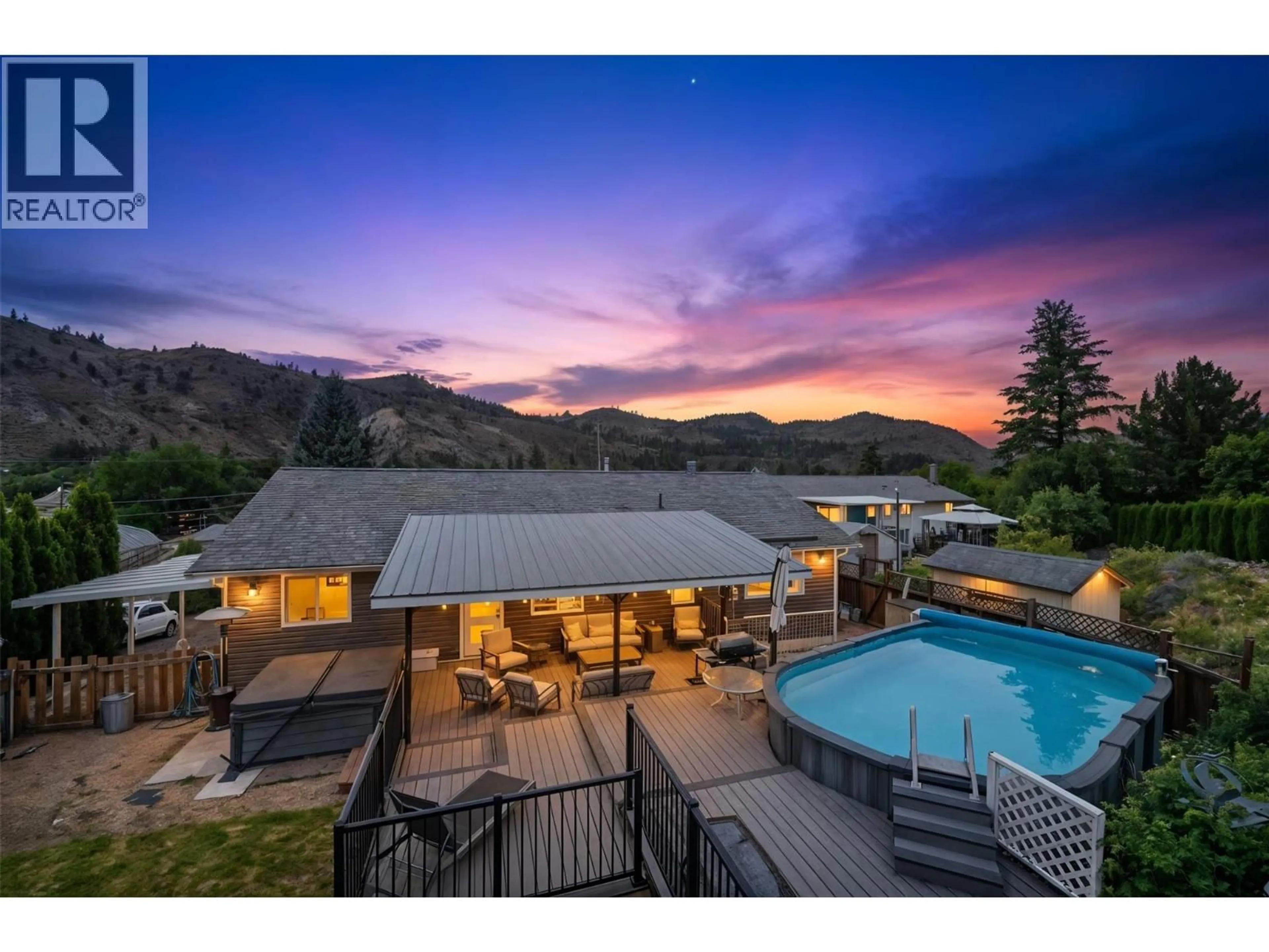 A pic from outside/outdoor area/front of a property/back of a property/a pic from drone, mountain view for 6763 MEADOWS DRIVE, Oliver British Columbia V0H1T4