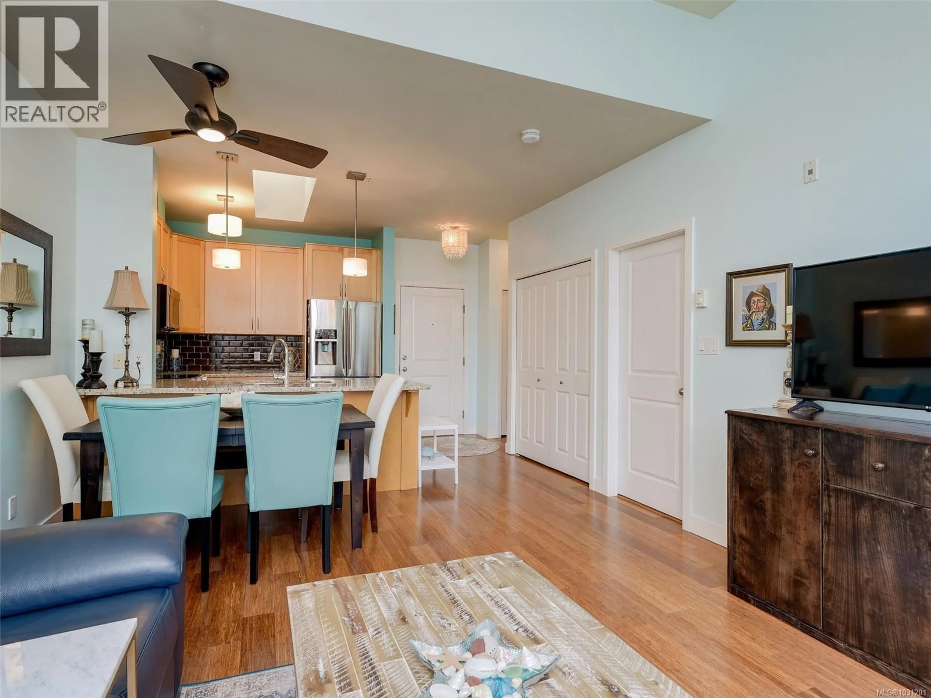 Open concept kitchen, wood/laminate floor for 408 - 611 GOLDSTREAM AVENUE, Langford British Columbia V9B2W9