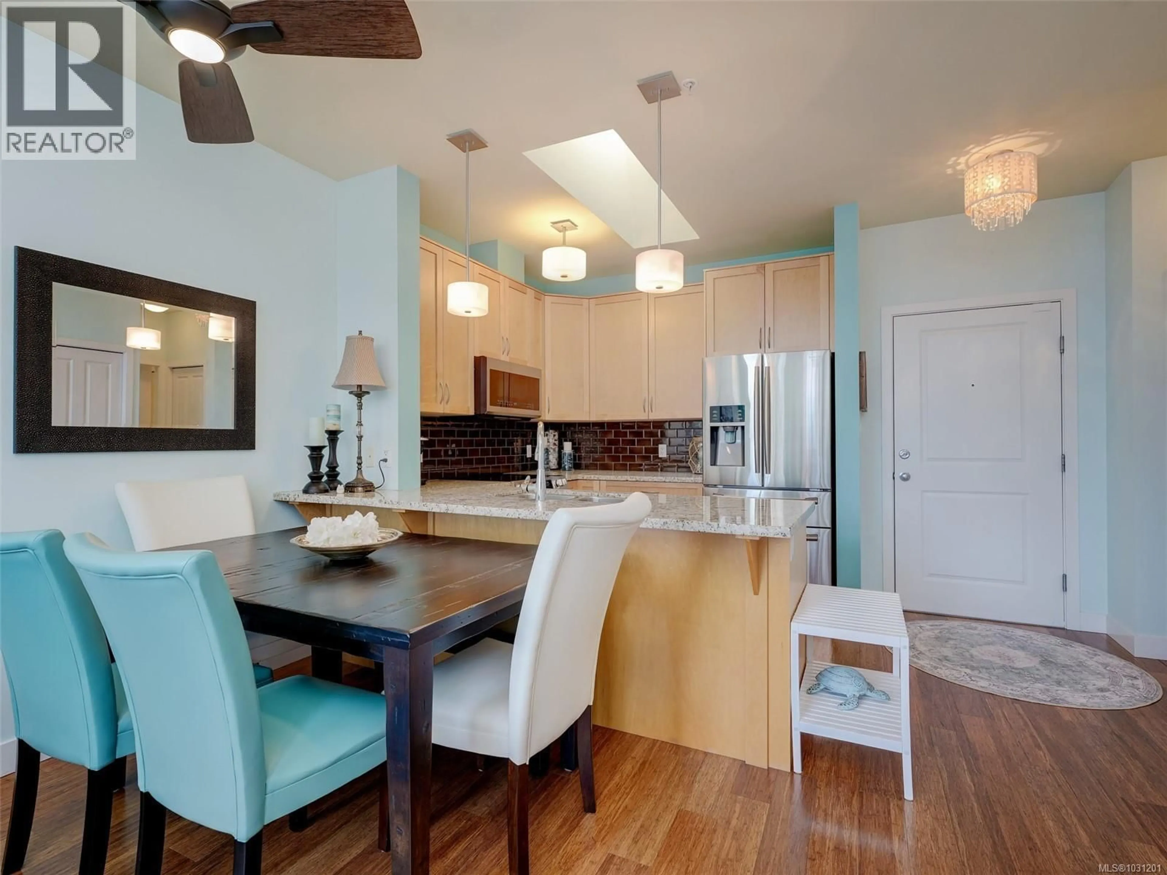 Open concept kitchen, wood/laminate floor for 408 - 611 GOLDSTREAM AVENUE, Langford British Columbia V9B2W9