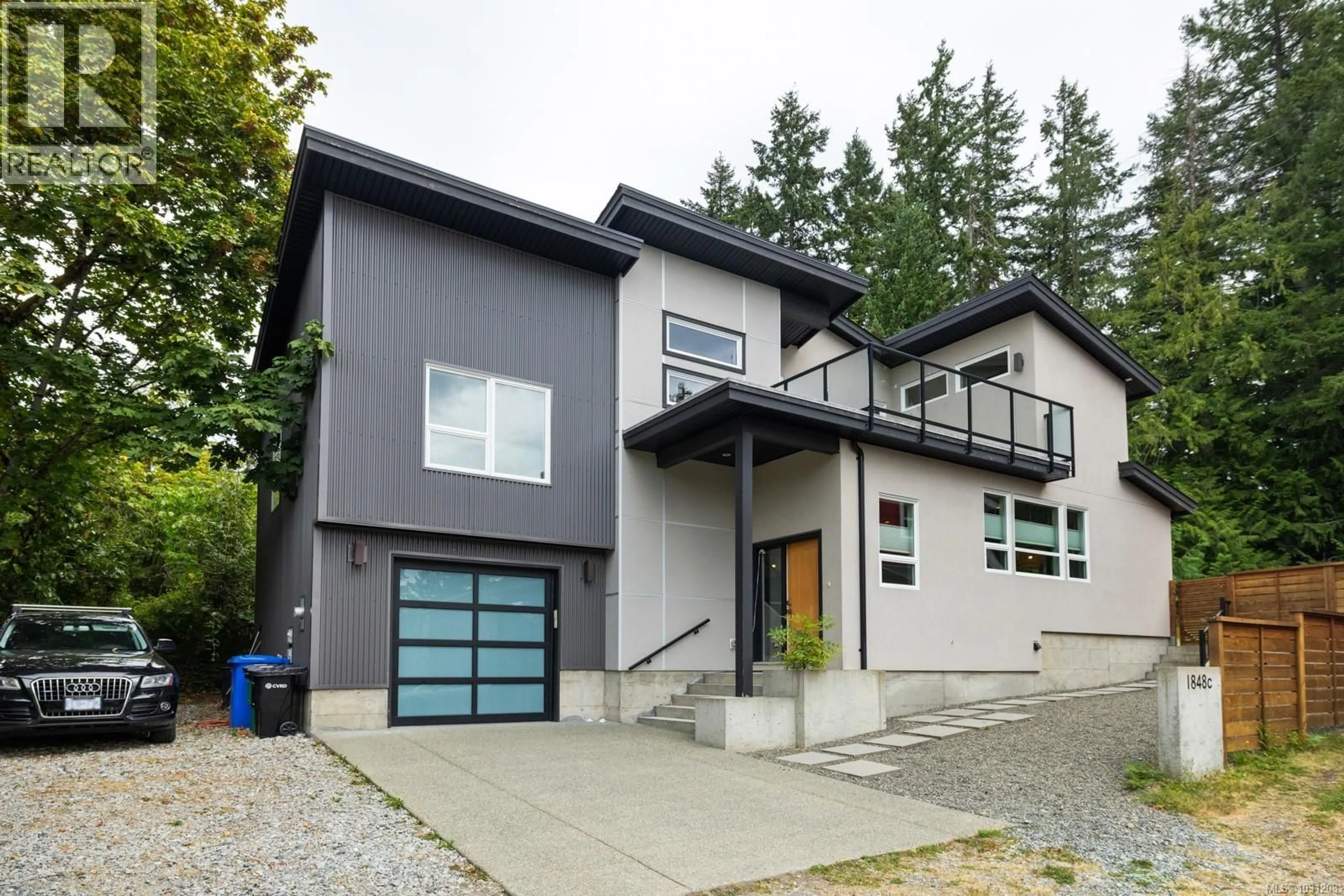 Home with vinyl exterior material, street for C-1848 NORBURY ROAD, Shawnigan Lake British Columbia V0R2W0