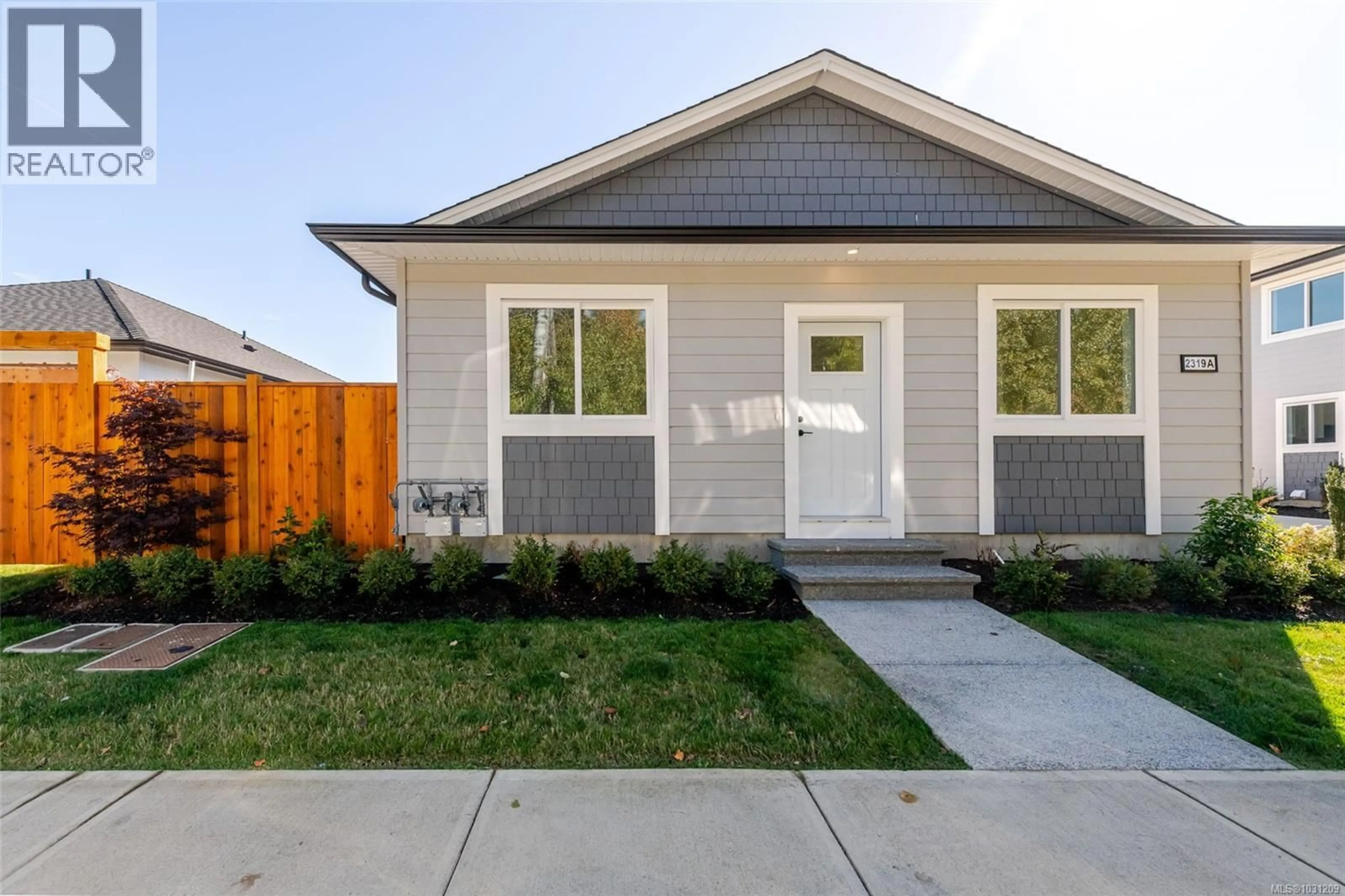 Home with vinyl exterior material, street for A - 2319 MCDONALD ROAD, Comox British Columbia V9M0C8