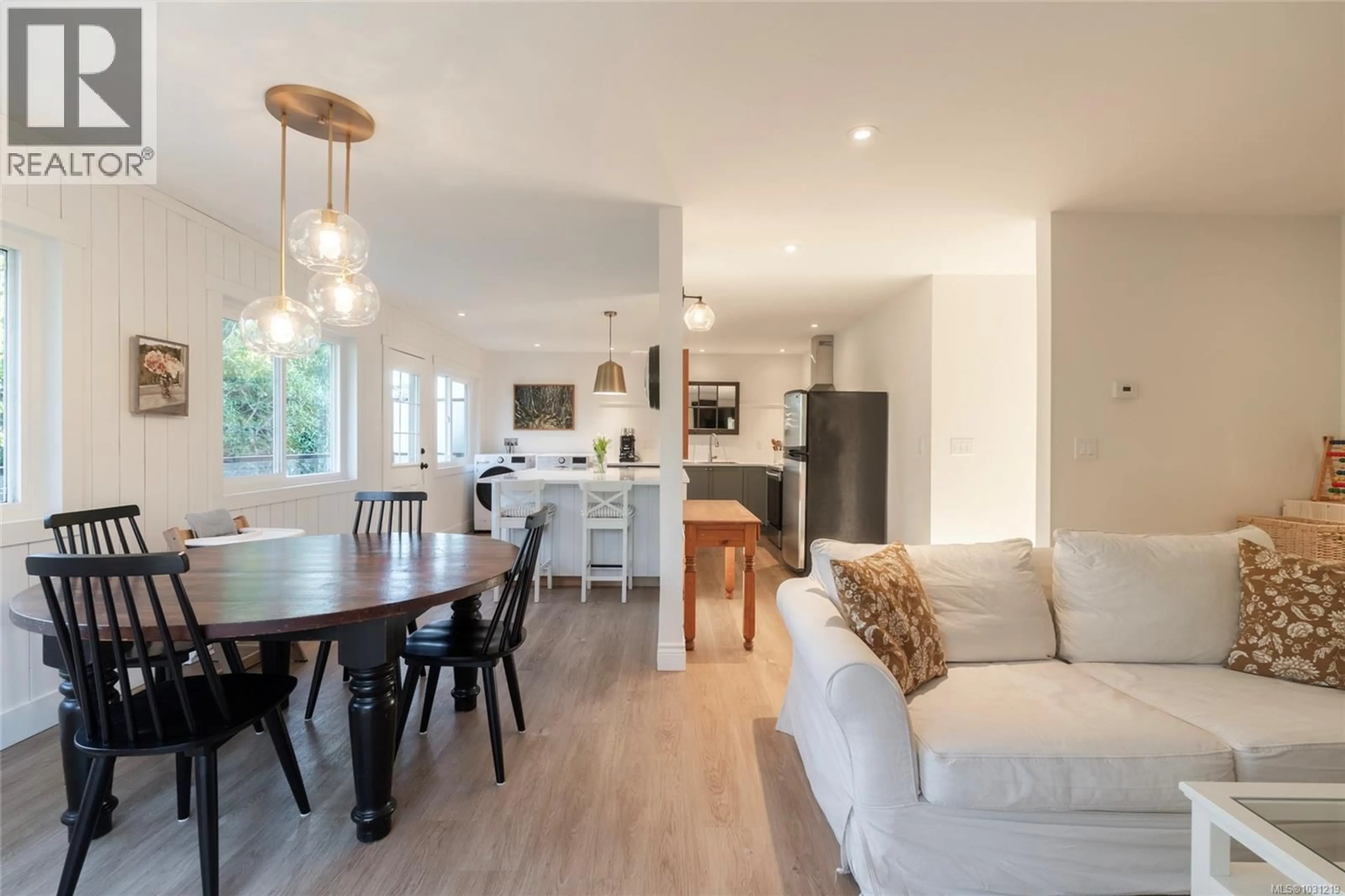 Open concept kitchen, wood/laminate floor for 323 MASTERS ROAD, Victoria British Columbia V8S1C9