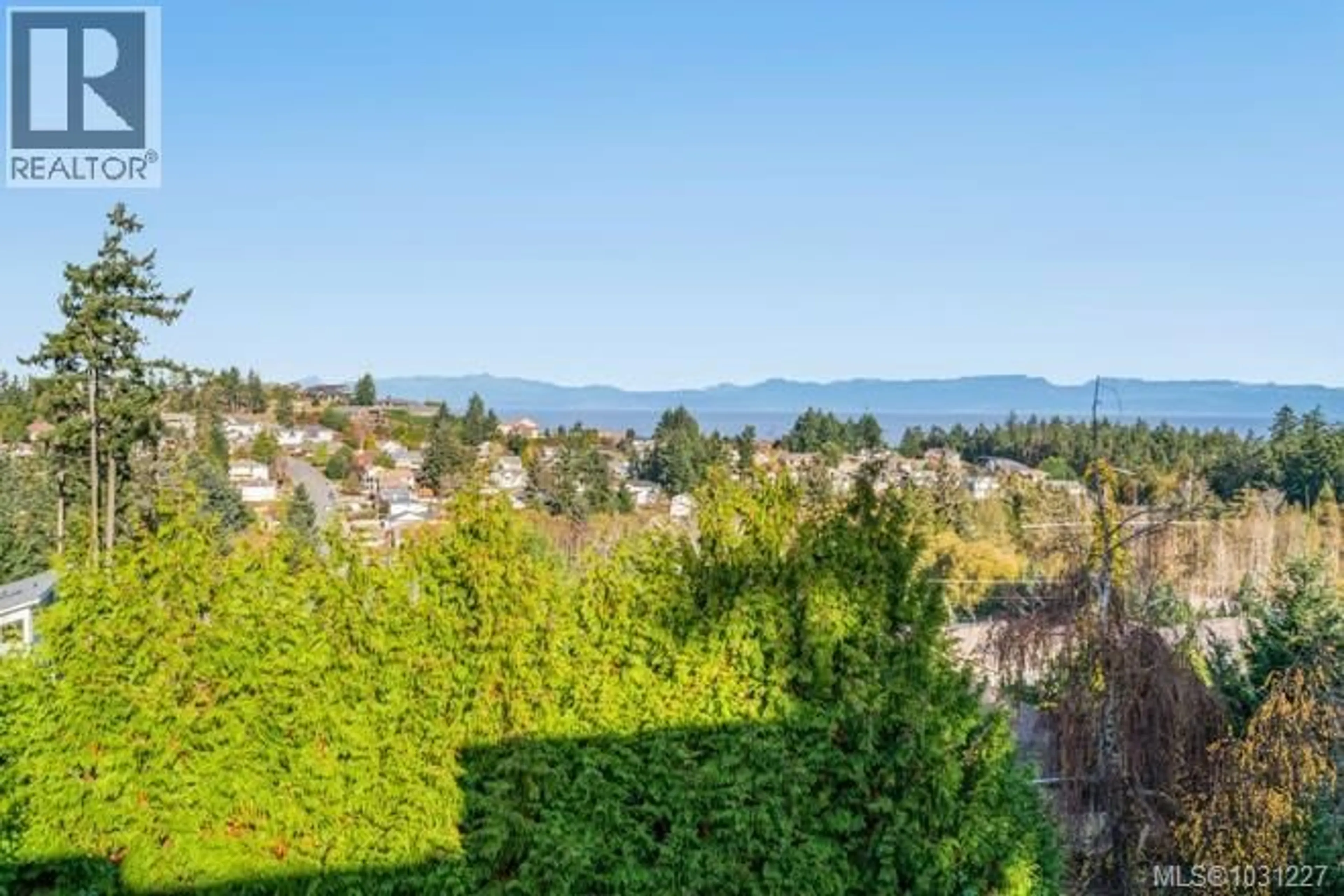 A pic from outside/outdoor area/front of a property/back of a property/a pic from drone, mountain view for 4648 SHERIDAN RIDGE ROAD, Nanaimo British Columbia V9T6S6