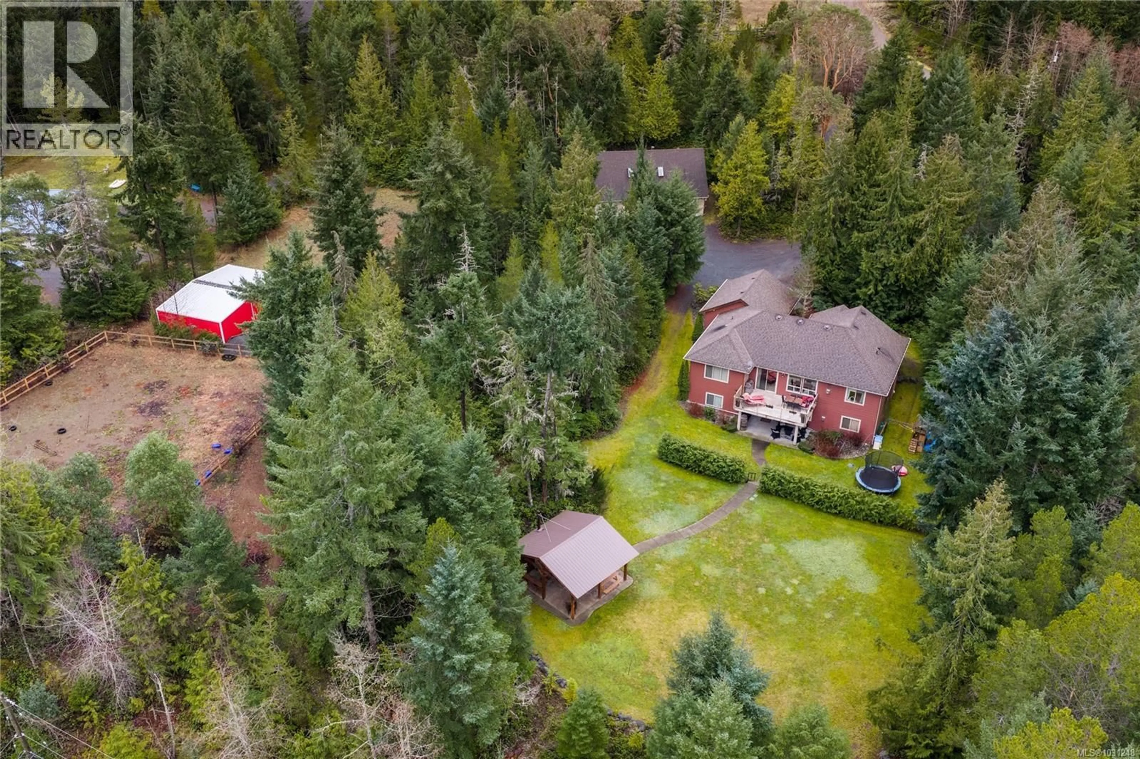 A pic from outside/outdoor area/front of a property/back of a property/a pic from drone, forest/trees view for 1755 GALVIN PLACE, Qualicum Beach British Columbia V9K2V3