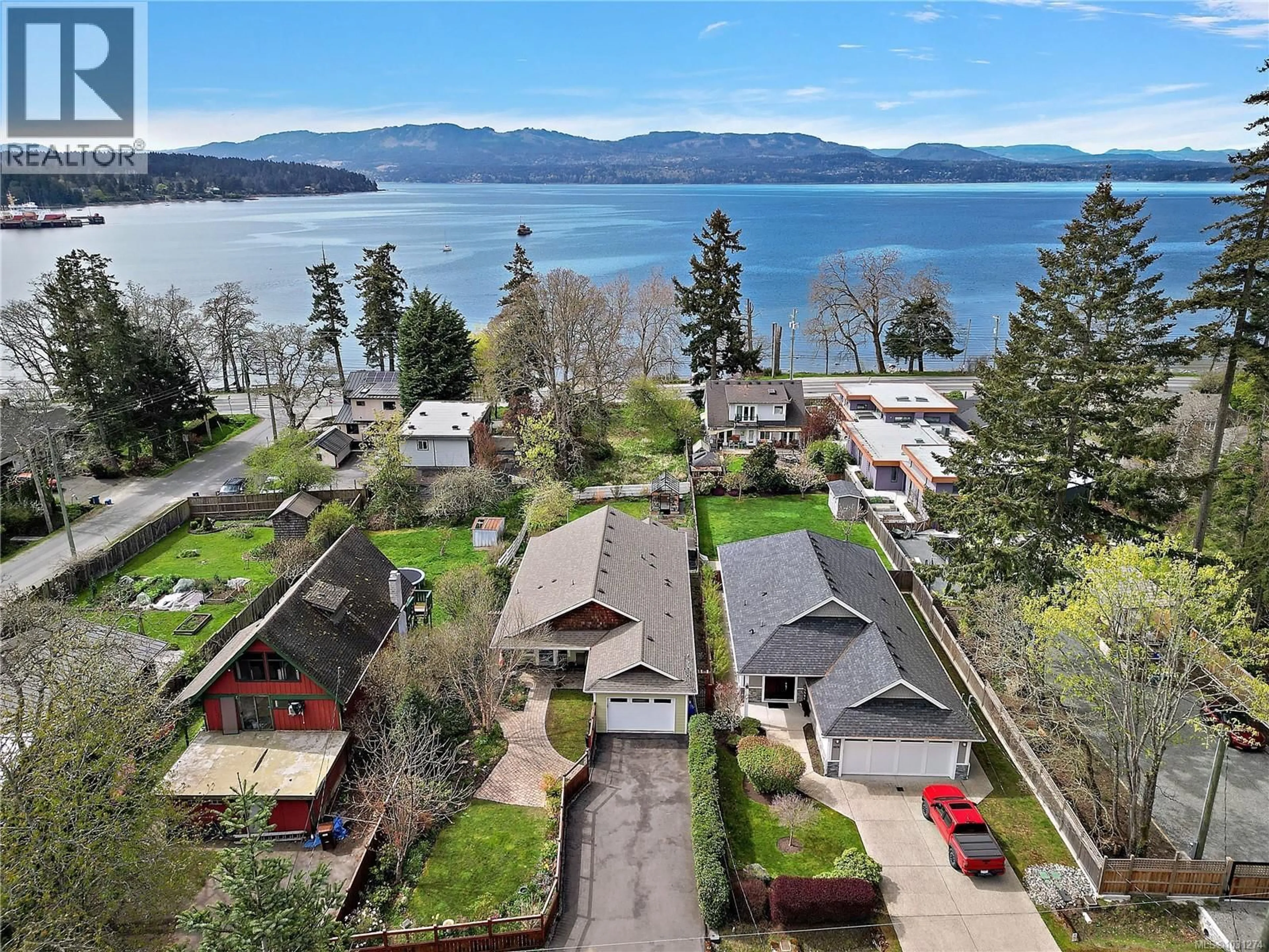 A pic from outside/outdoor area/front of a property/back of a property/a pic from drone, water/lake/river/ocean view for 10274 TSAYKUM ROAD, North Saanich British Columbia V8L5T8