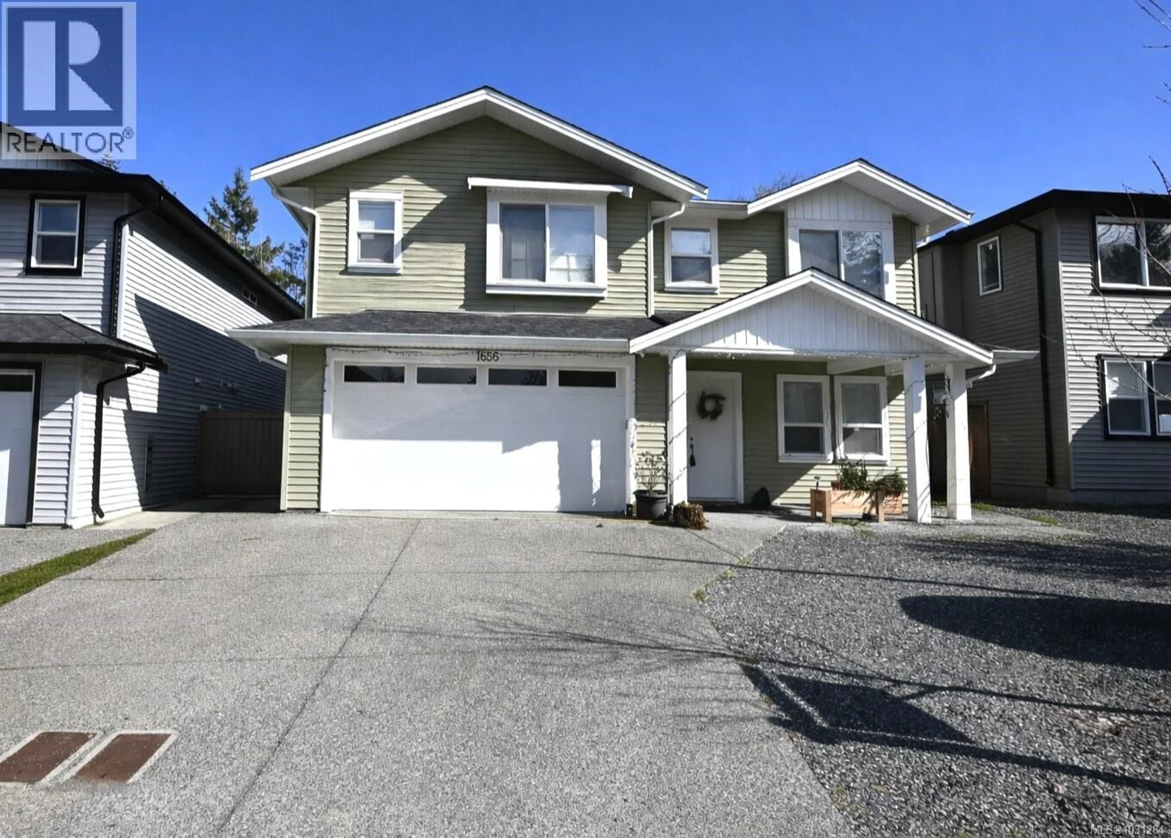 Home with vinyl exterior material, street for 1656 ROBERTA ROAD SOUTH, Nanaimo British Columbia V9X0B6