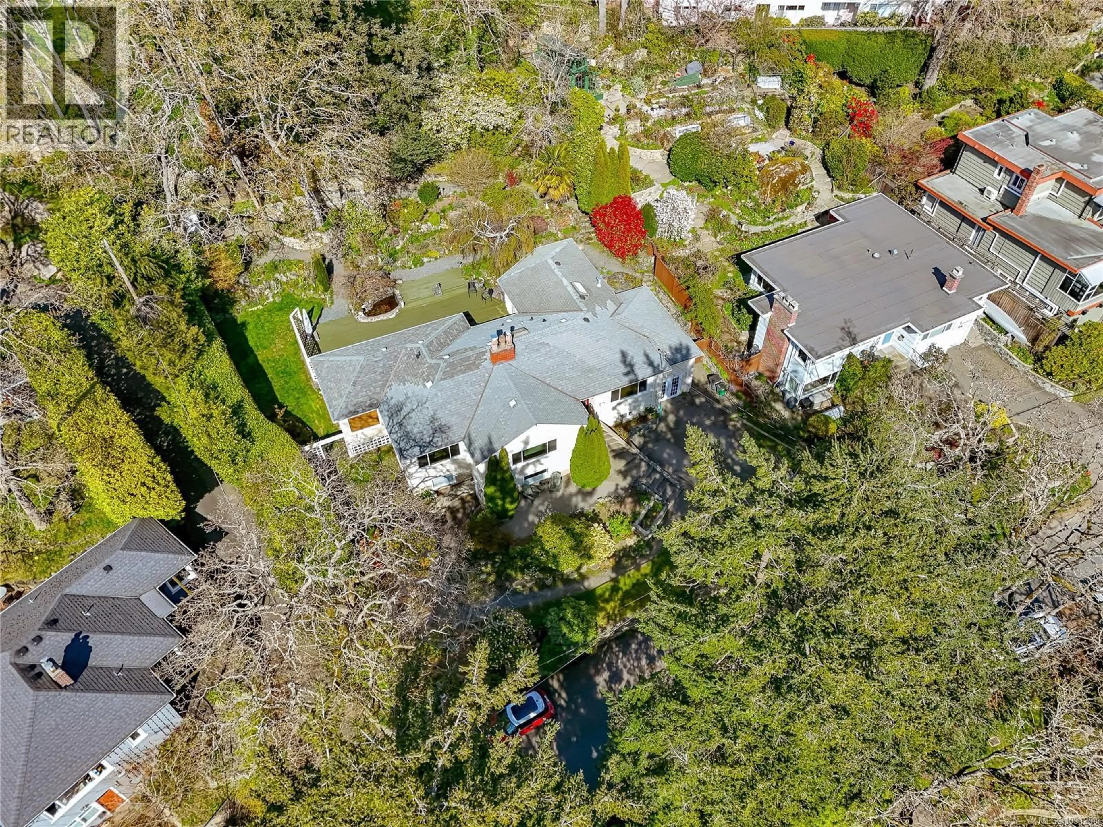 A pic from outside/outdoor area/front of a property/back of a property/a pic from drone, street for 1184 CLOVELLY TERRACE, Saanich British Columbia V8P1V6