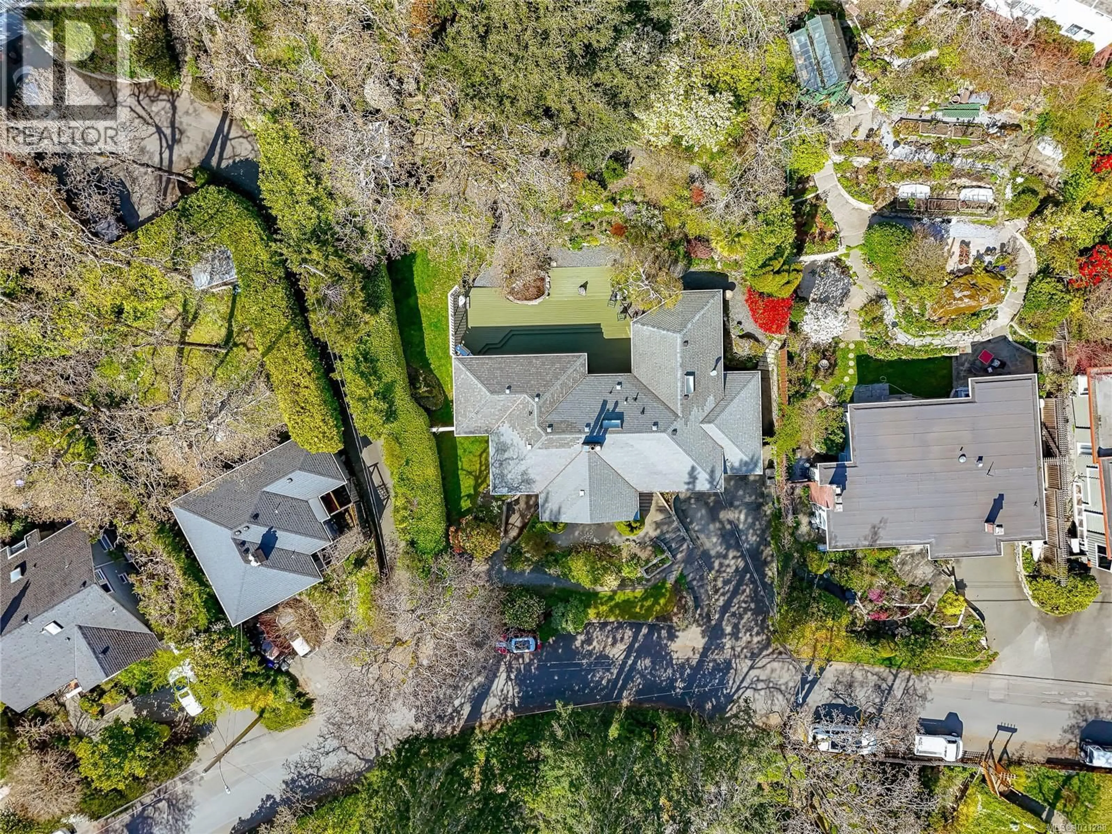 A pic from outside/outdoor area/front of a property/back of a property/a pic from drone, street for 1184 CLOVELLY TERRACE, Saanich British Columbia V8P1V6