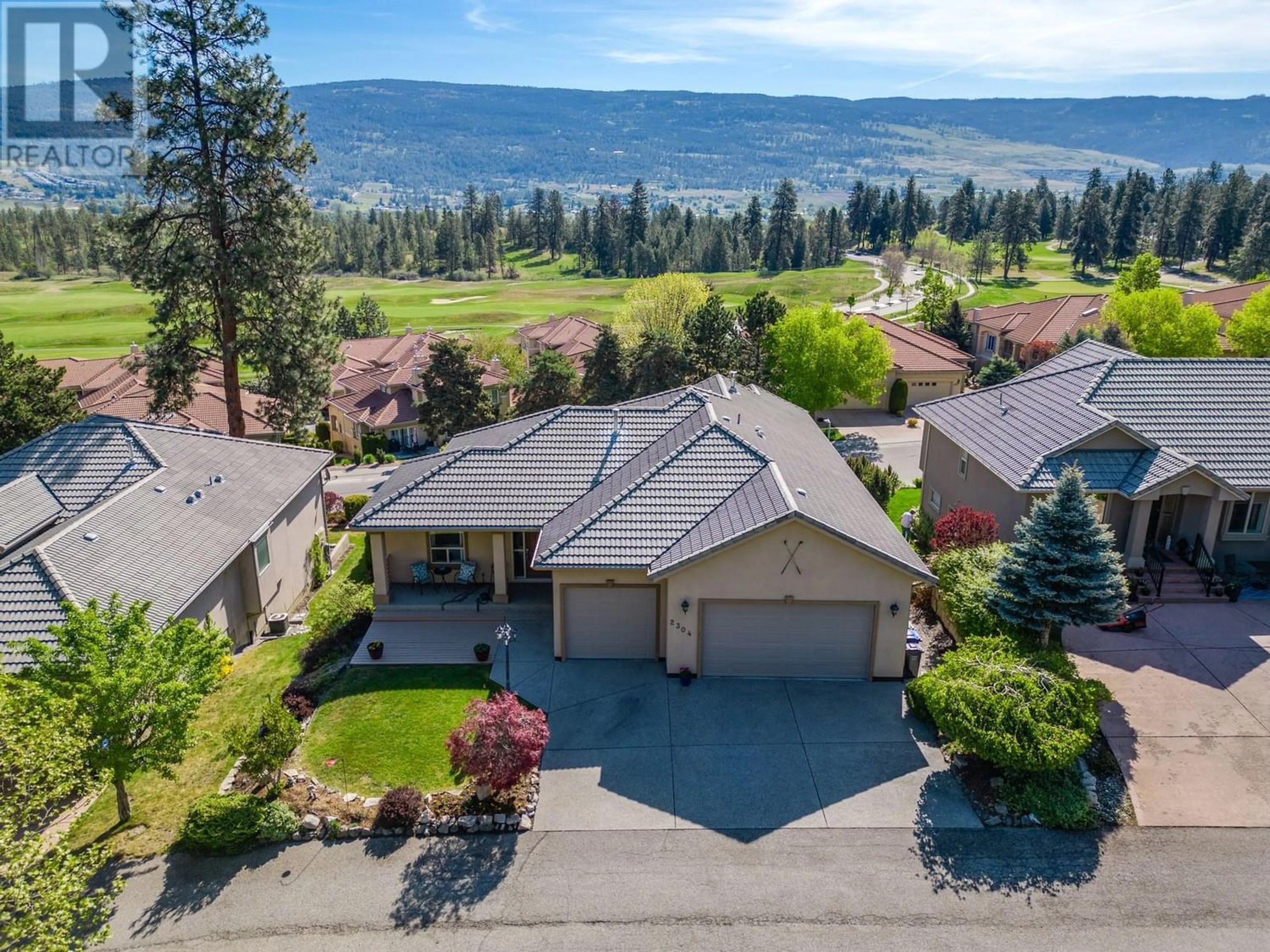 Frontside or backside of a home for 2304 Capistrano Drive, Kelowna British Columbia V1V2A2