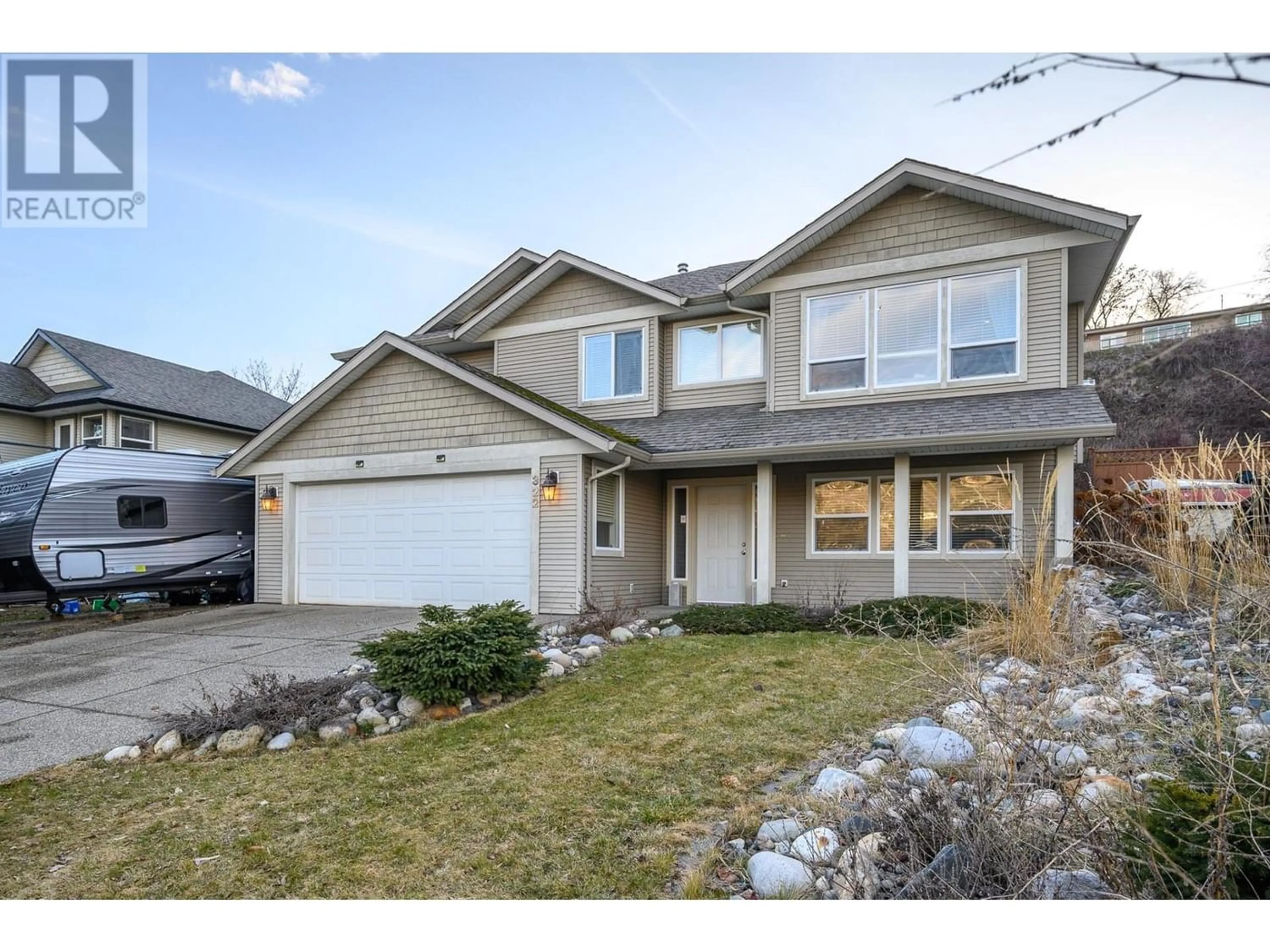 Frontside or backside of a home for 322 Inverness Drive, Coldstream British Columbia V1B3W1