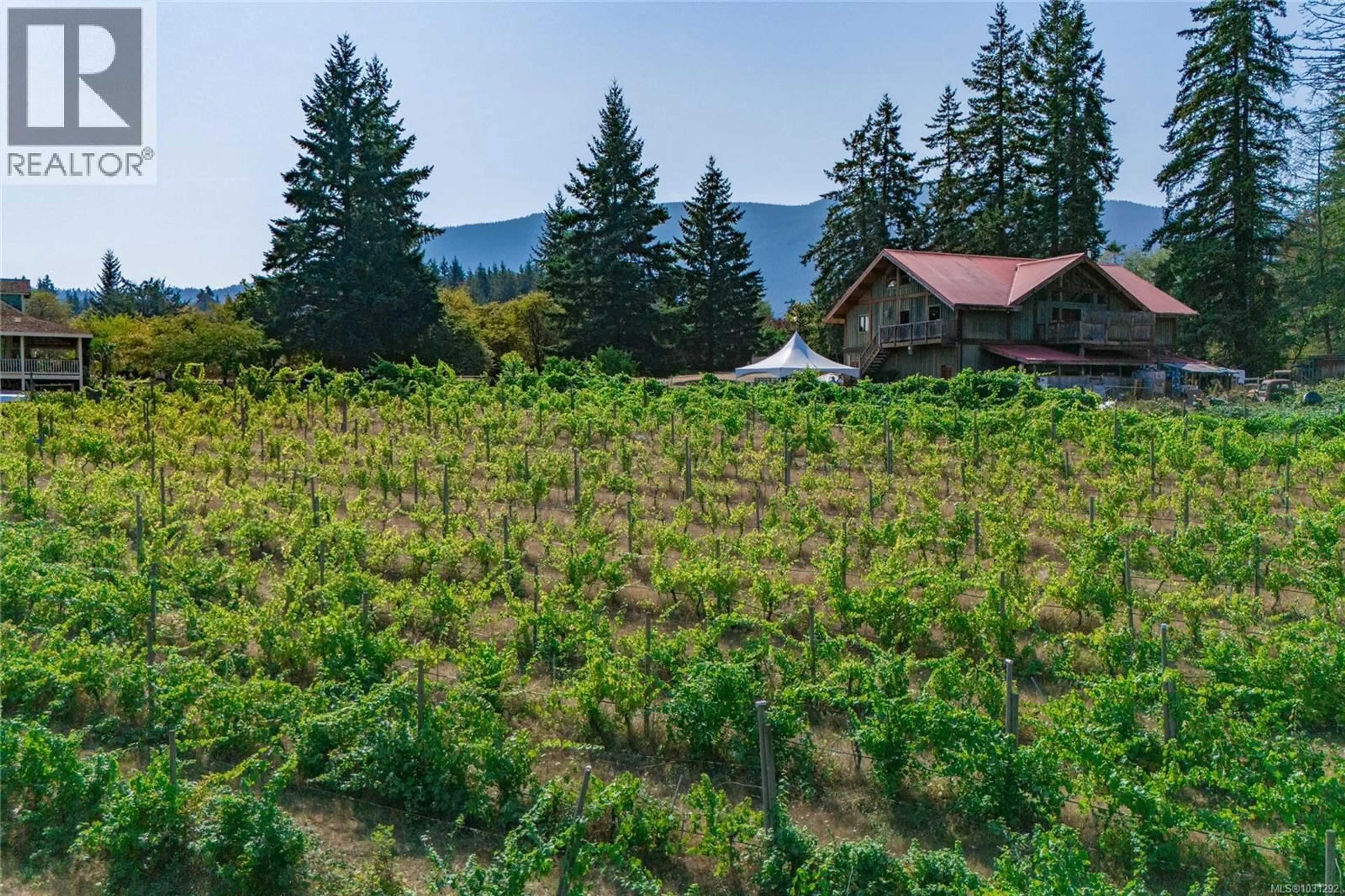 A pic from outside/outdoor area/front of a property/back of a property/a pic from drone, mountain view for 2300 EAST WELLINGTON ROAD, Nanaimo British Columbia V9R6V7