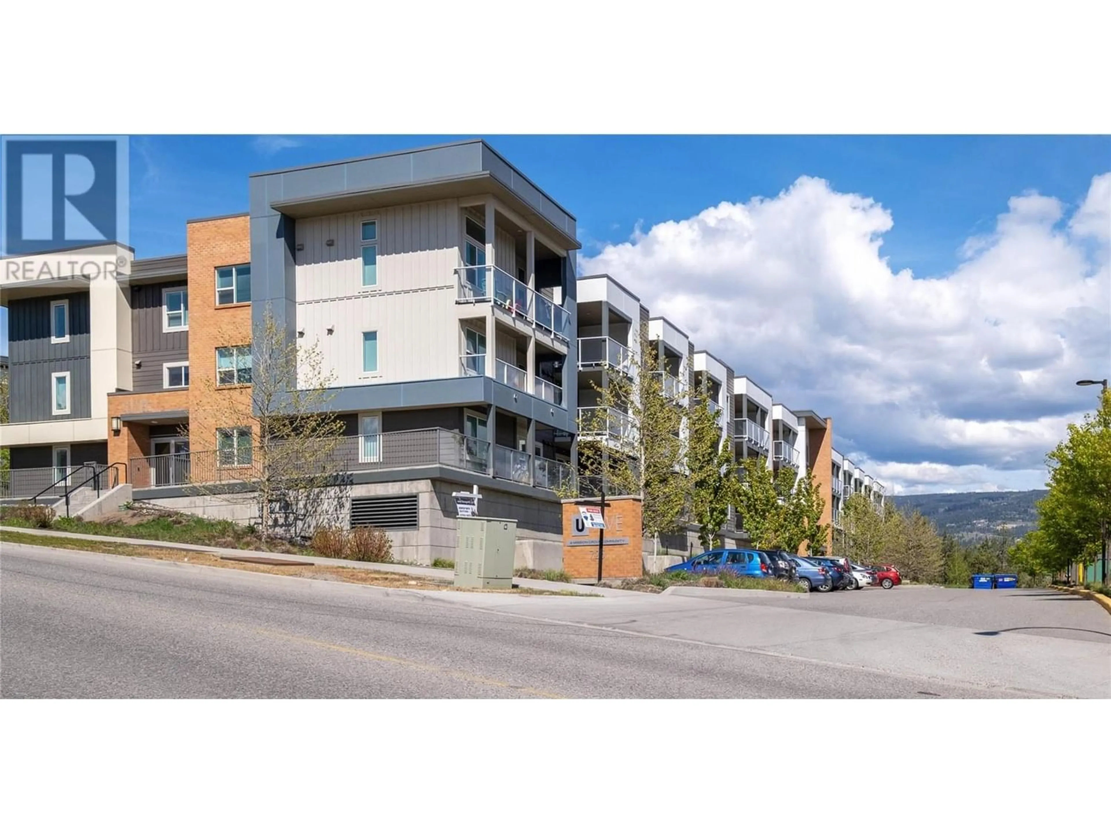 A pic from exterior of the house or condo for 725 Academy Way Unit# 126, Kelowna British Columbia V1B0B8
