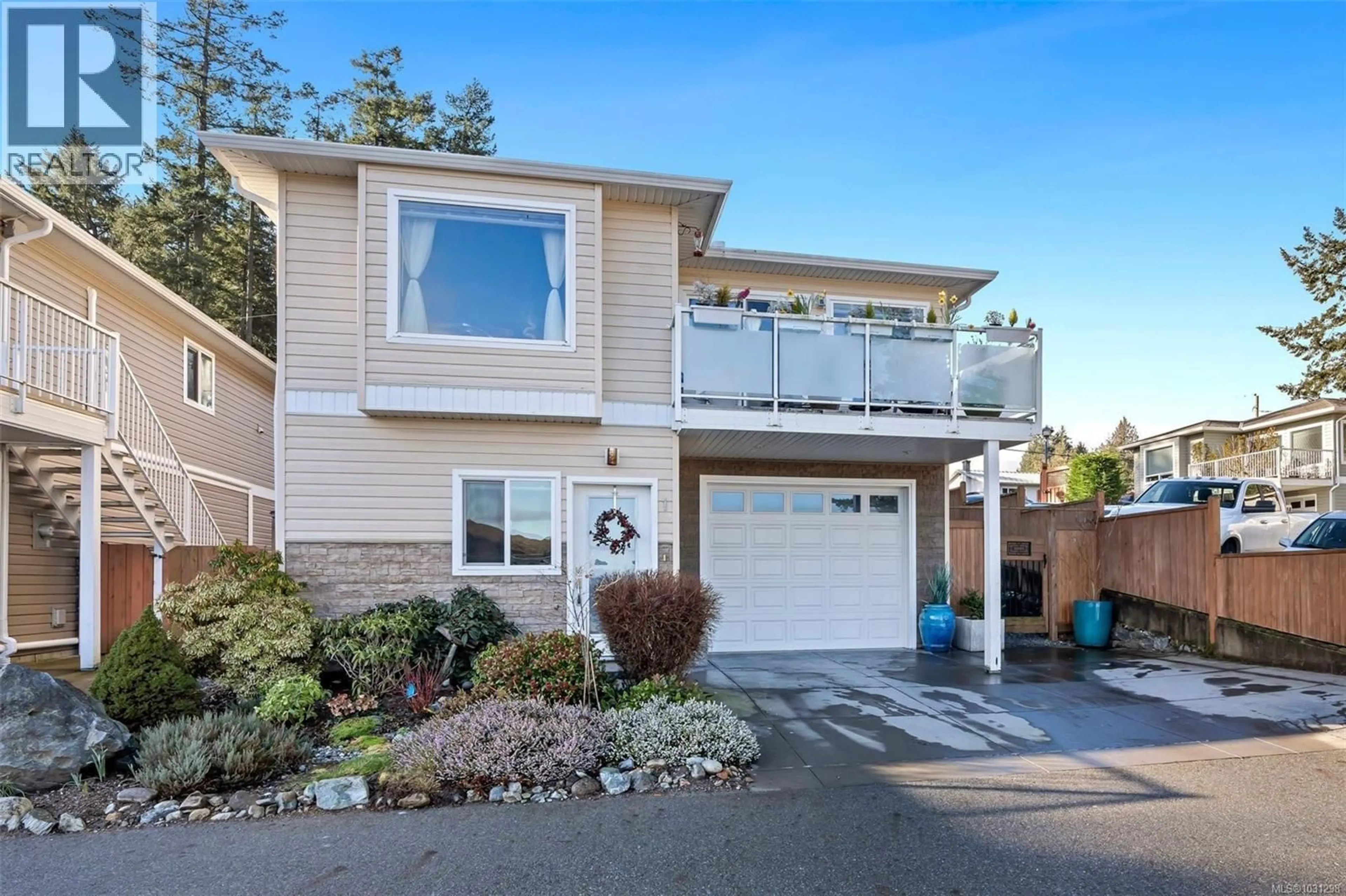Home with vinyl exterior material, street for 1 - 2740 STAUTW ROAD, Central Saanich British Columbia V8M0A8