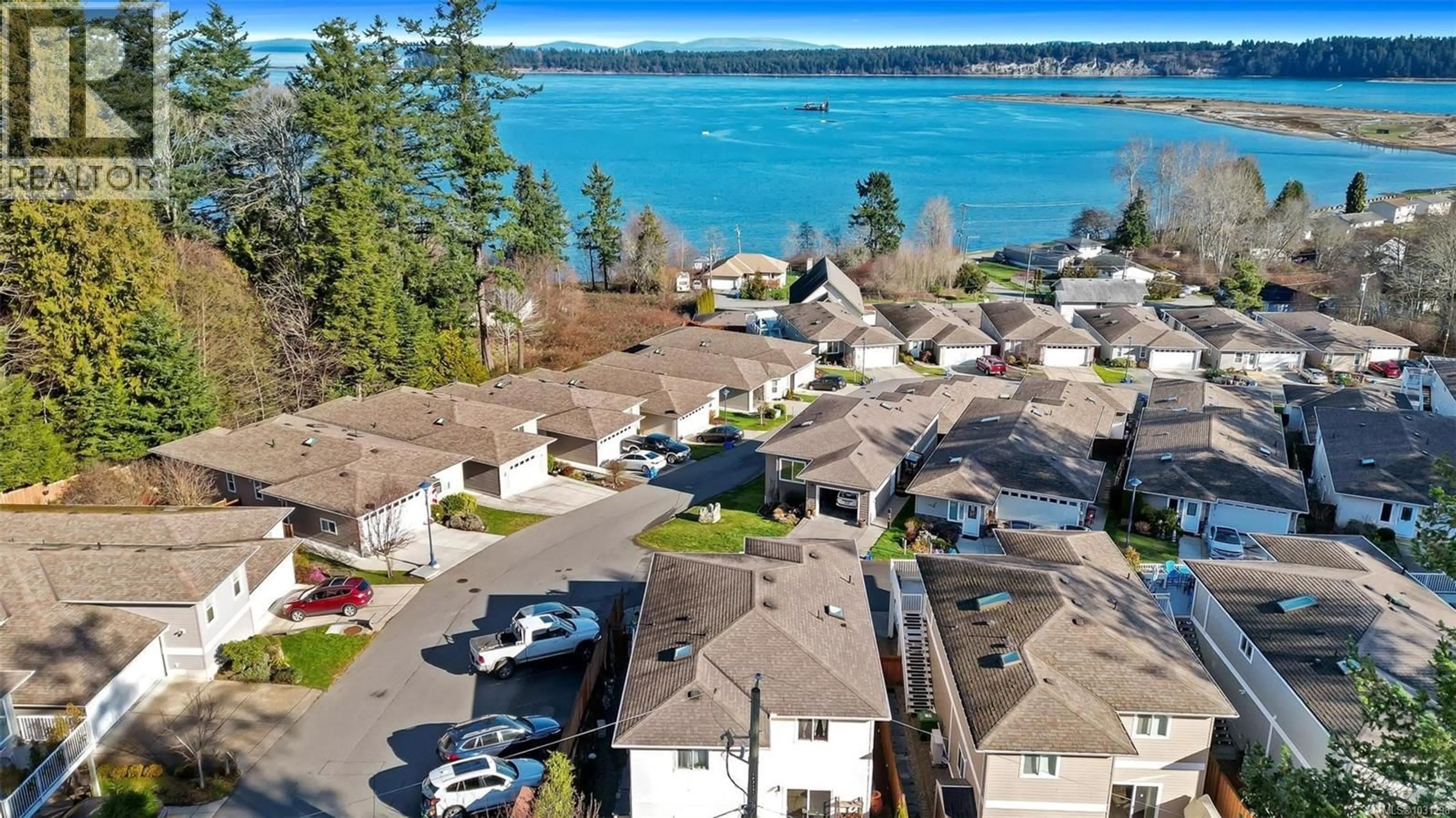 A pic from outside/outdoor area/front of a property/back of a property/a pic from drone, water/lake/river/ocean view for 1 - 2740 STAUTW ROAD, Central Saanich British Columbia V8M0A8