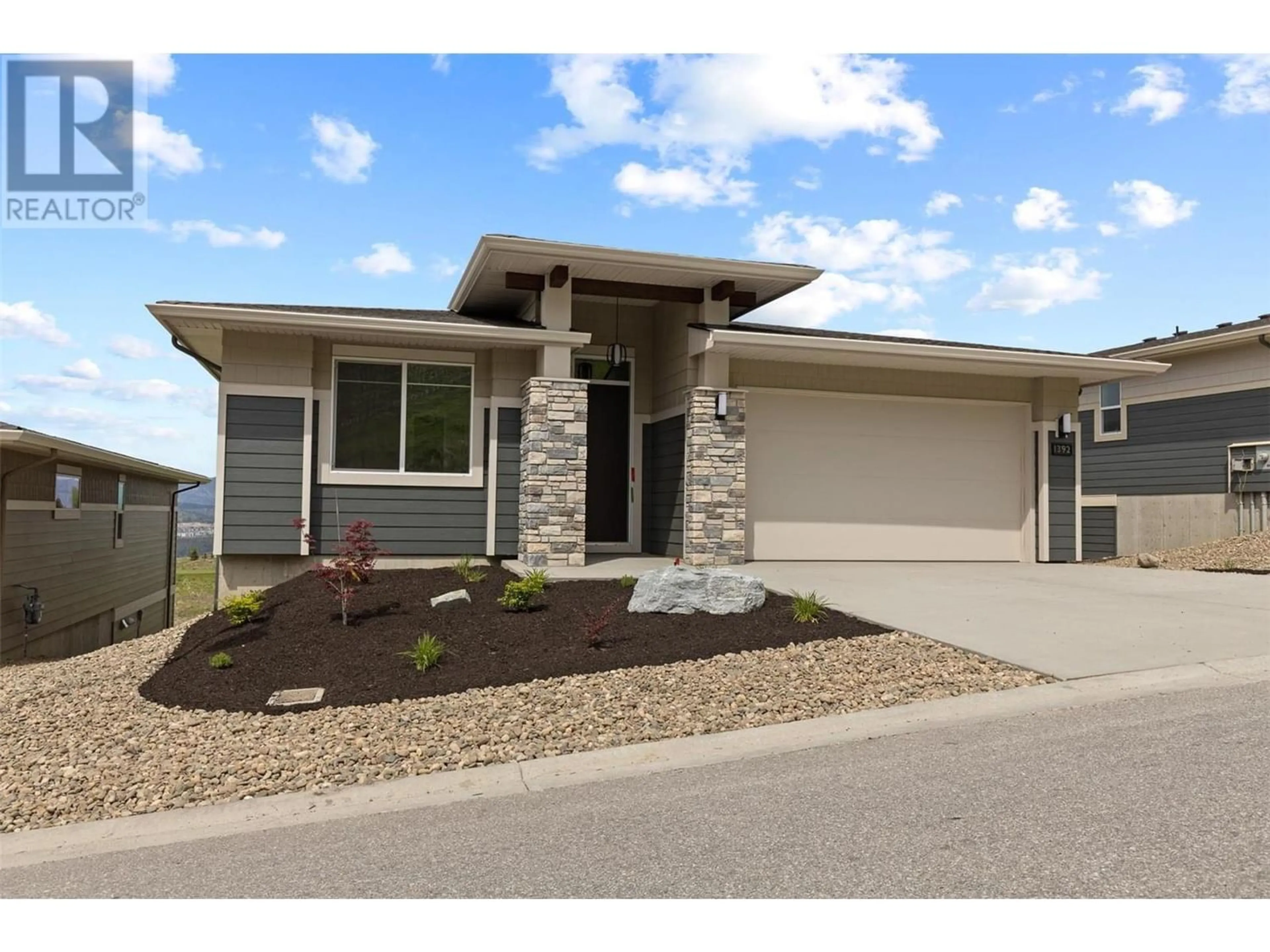 Frontside or backside of a home for 1392 Tower Ranch Drive, Kelowna British Columbia V1P1T8