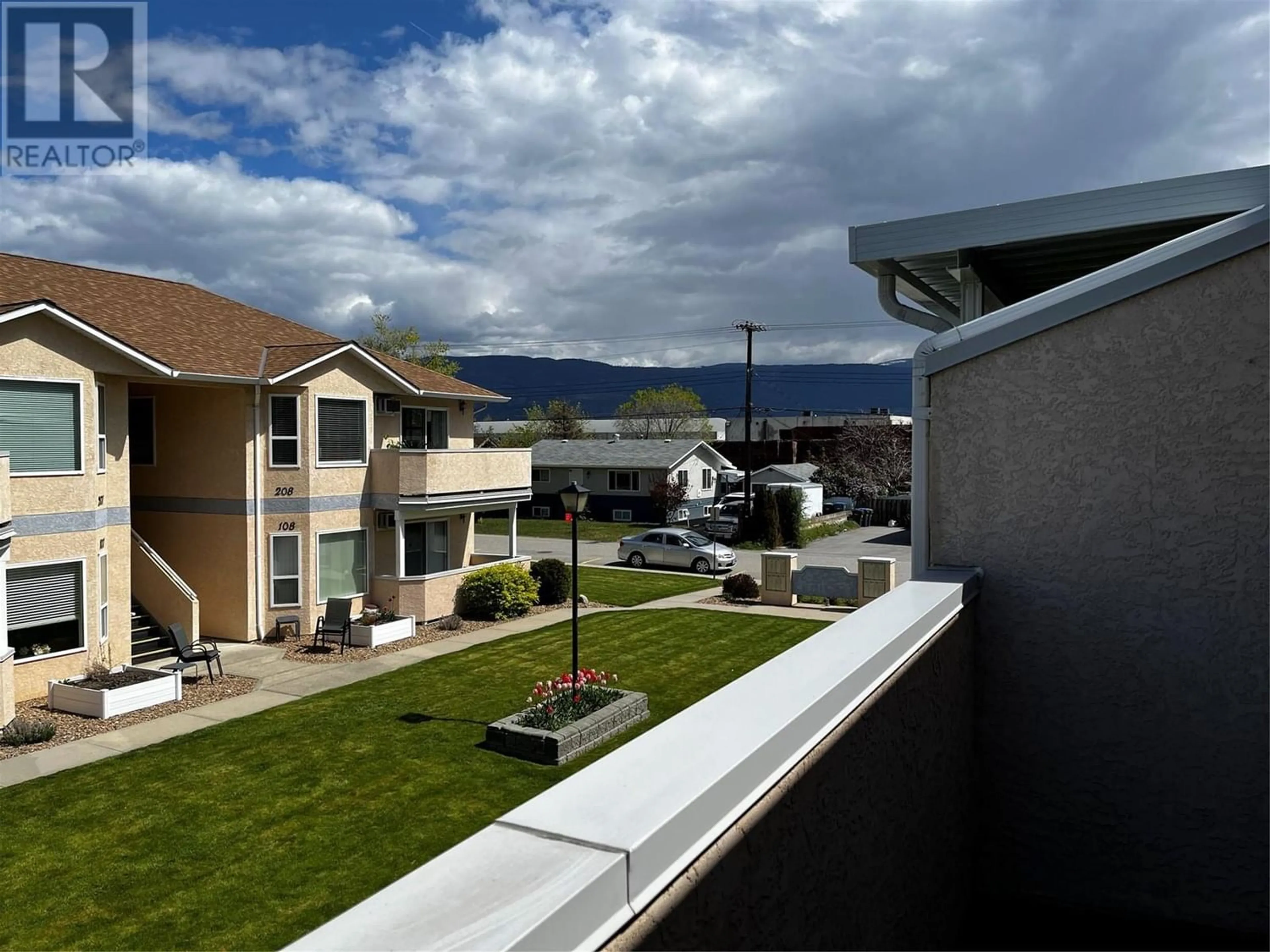 A pic from exterior of the house or condo for 13014 Armstrong Avenue Unit# 202, Summerland British Columbia V0H1Z5