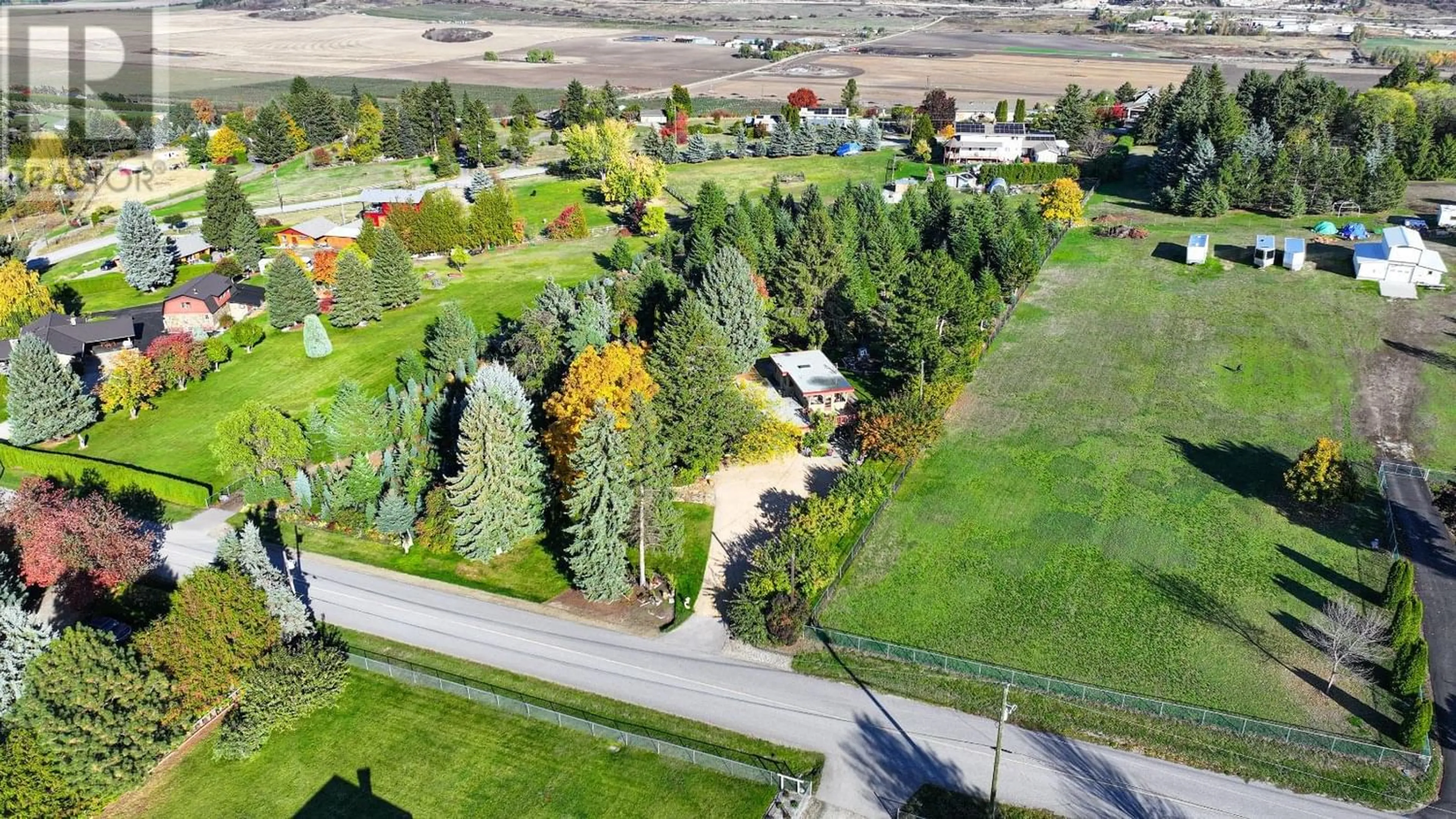 A pic from outside/outdoor area/front of a property/back of a property/a pic from drone, street for 239 Stepping Stones Crescent, Spallumcheen British Columbia V1H1X2