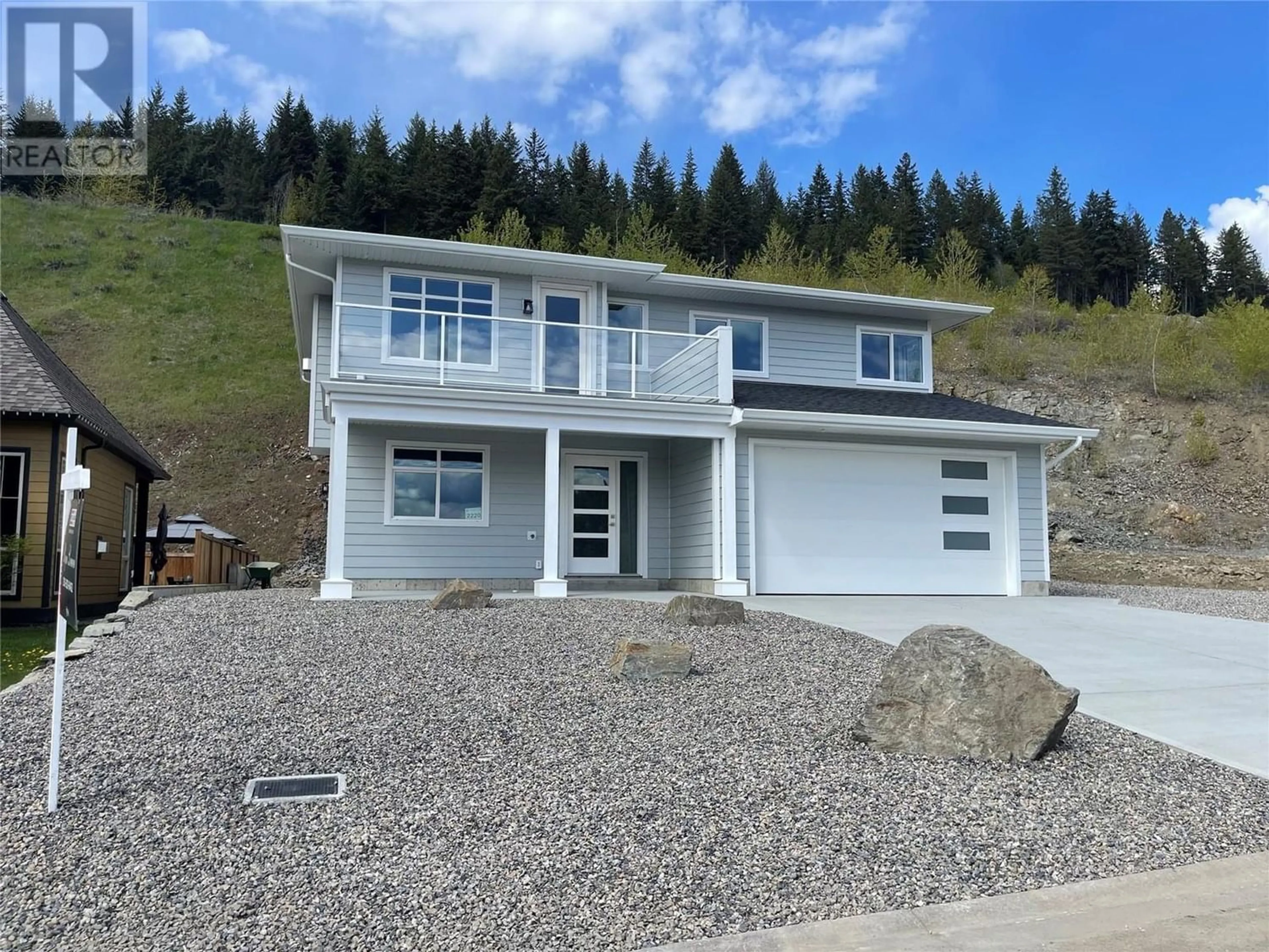 Home with vinyl exterior material for 2220 Mountain View Avenue, Lumby British Columbia V0E2G0