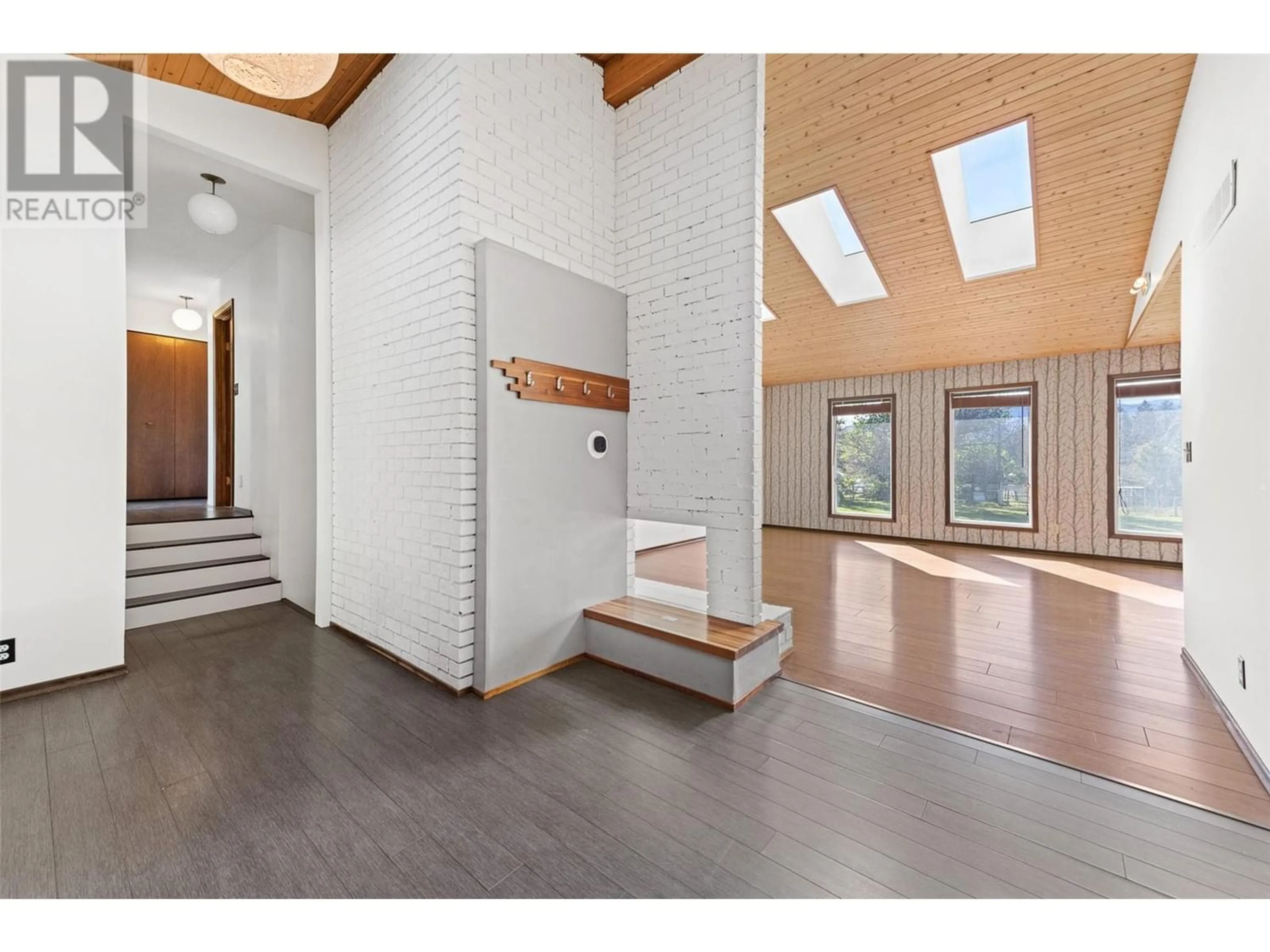 Indoor foyer, wood floors for 5156 Mackinnon Road, Peachland British Columbia V0H1X2