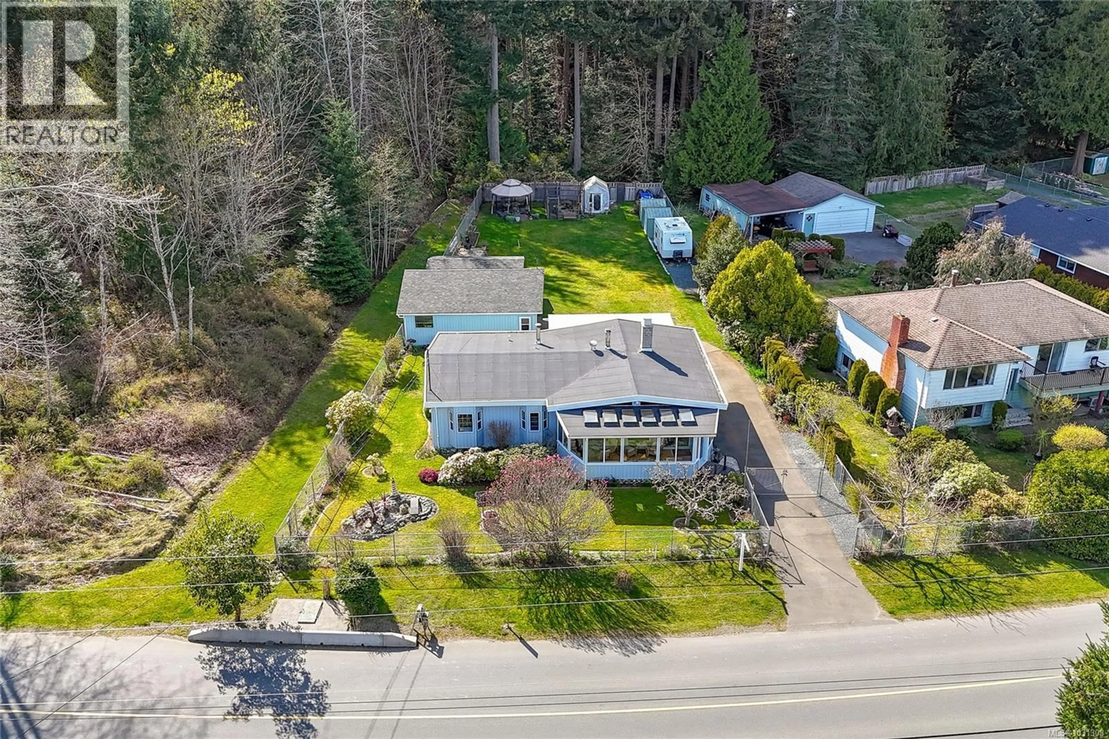 A pic from outside/outdoor area/front of a property/back of a property/a pic from drone, street for 5340 GAINSBERG ROAD, Bowser British Columbia V0R1G0