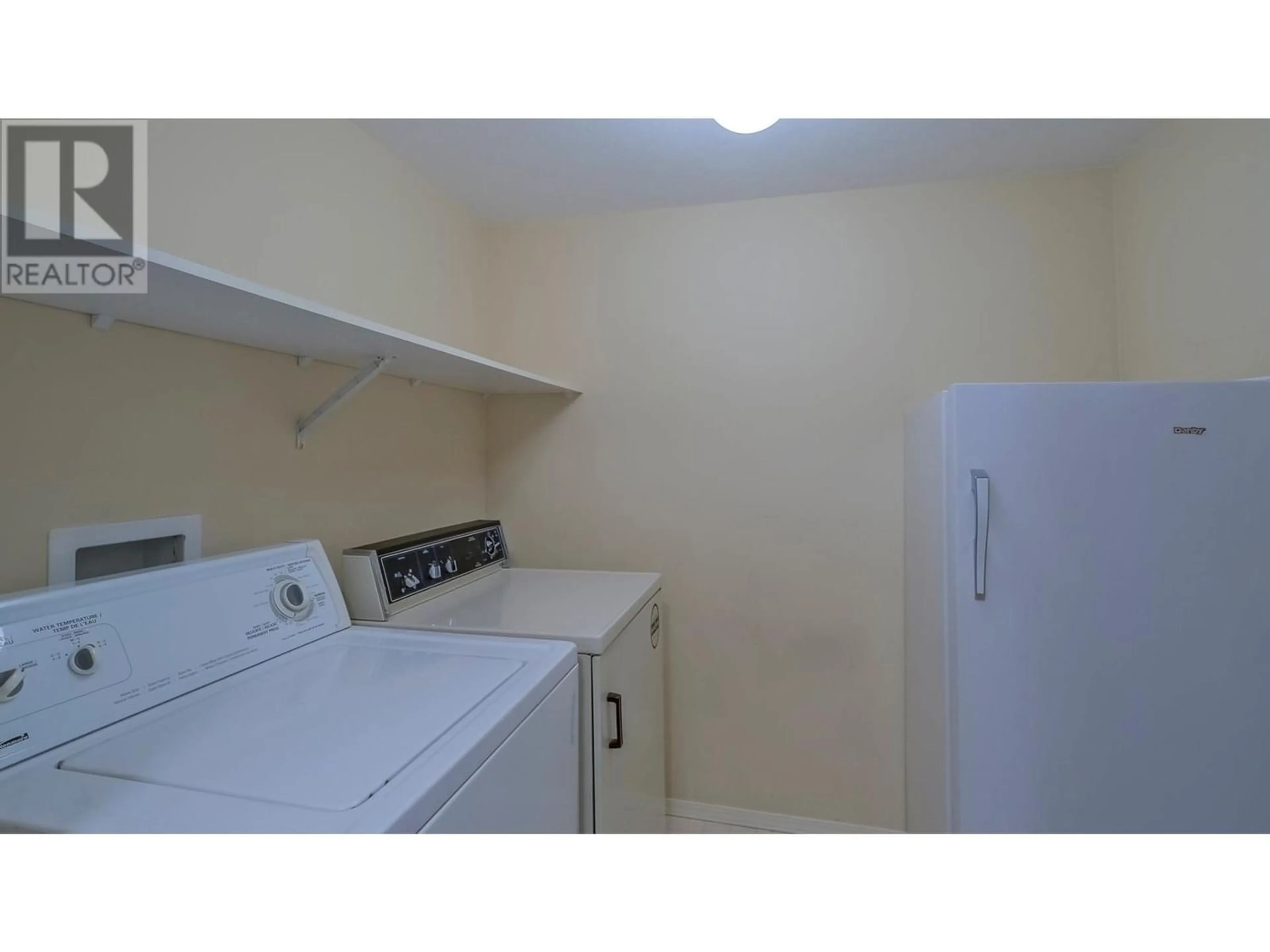 Laundry room for 680 Doyle Avenue Unit# 106, Kelowna British Columbia V1Y9S2