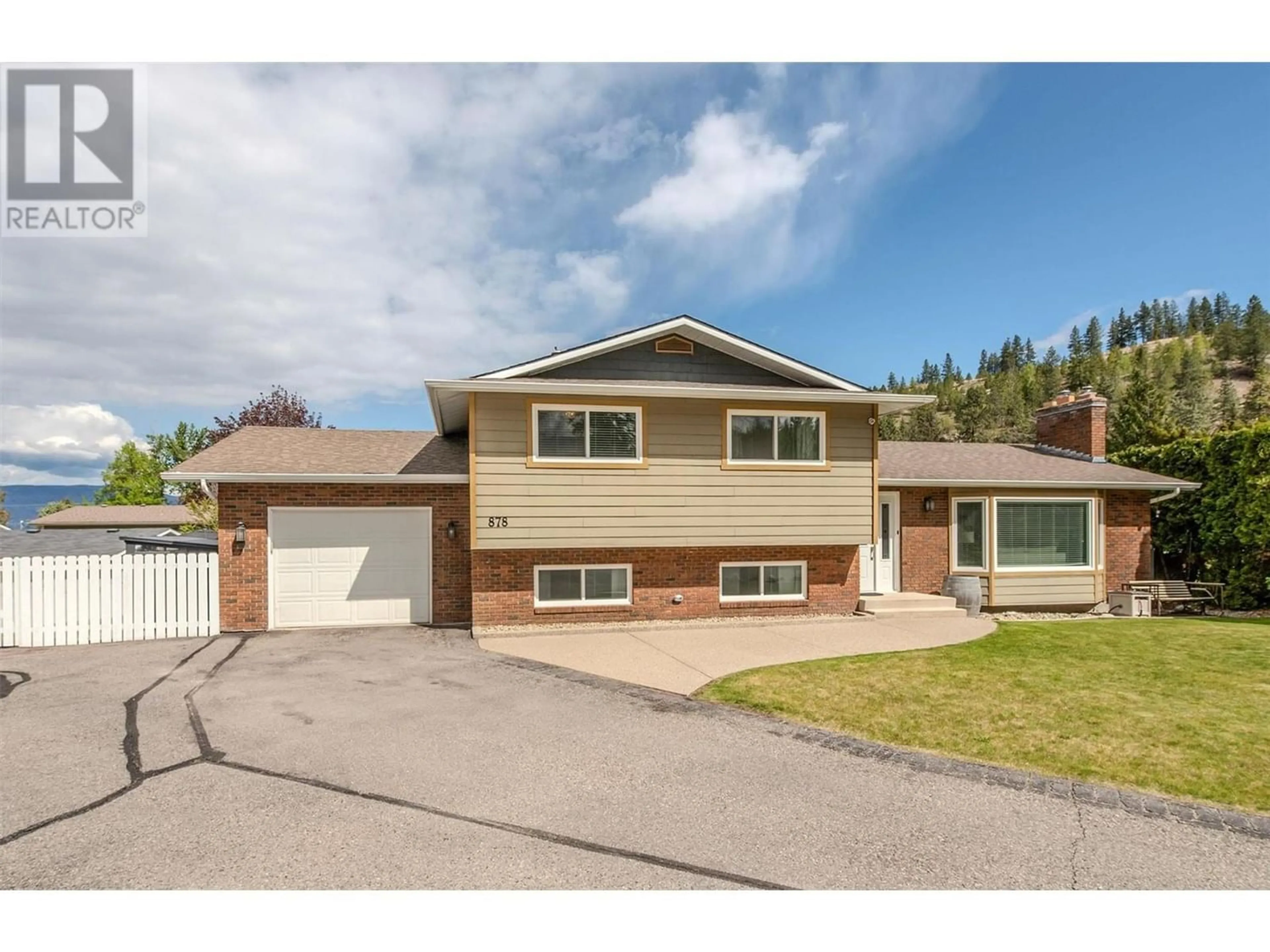 Frontside or backside of a home for 878 Roma Court, Kelowna British Columbia V1W2P6