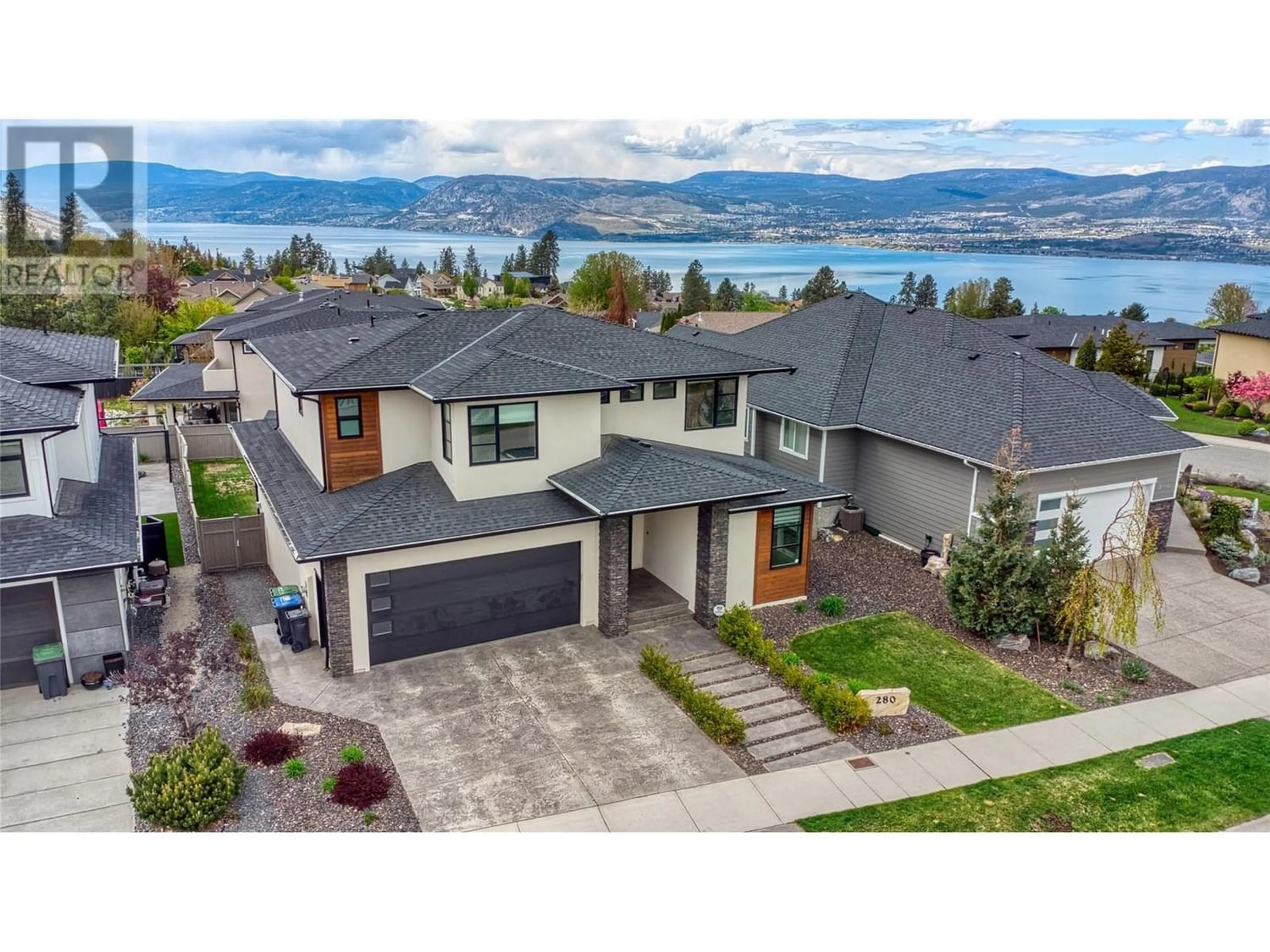 Frontside or backside of a home for 280 Quilchena Drive, Kelowna British Columbia V1W5C1