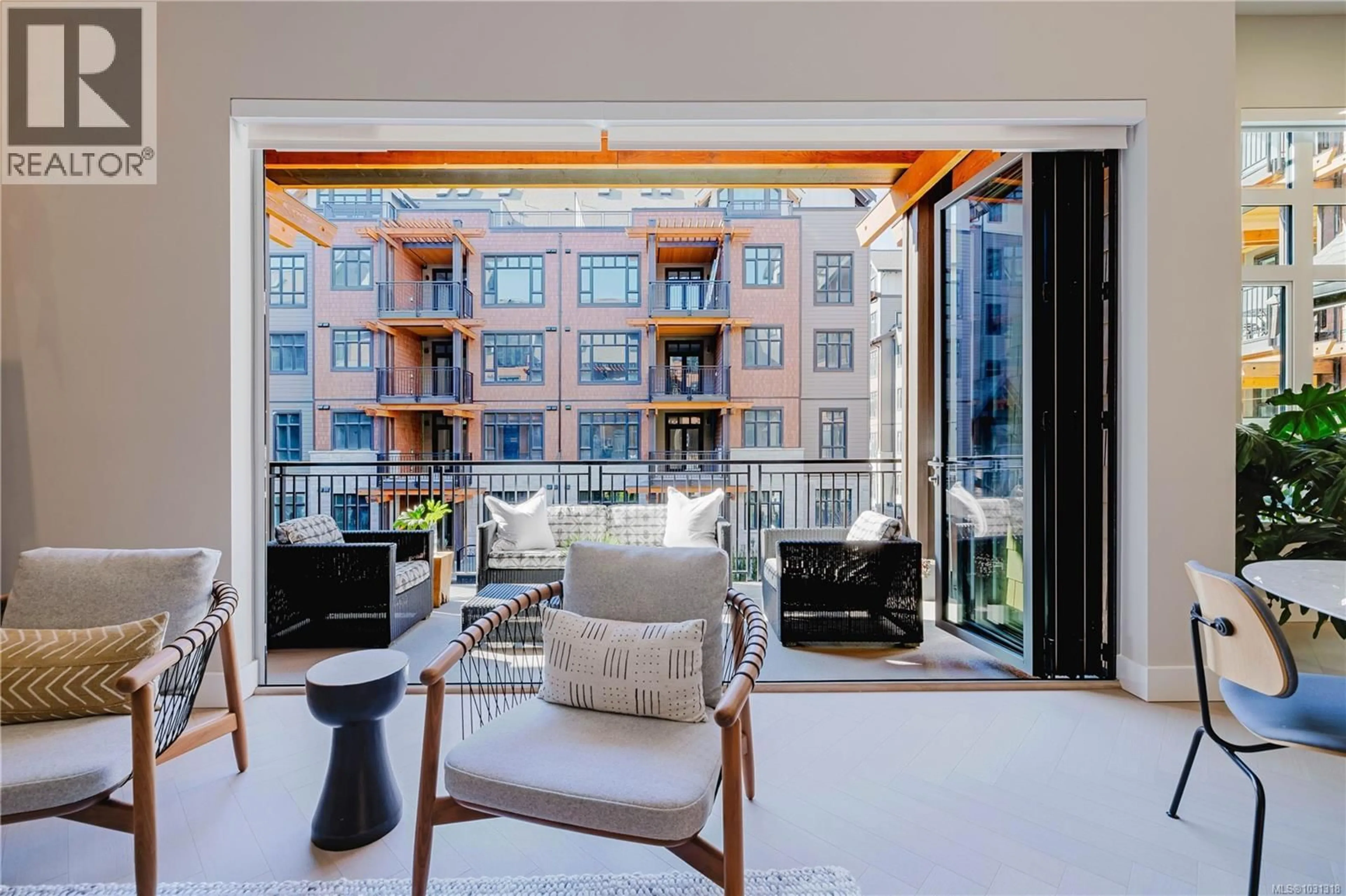 Balcony in the apartment, city buildings view from balcony for 207 - 427 LAMPSON STREET, Esquimalt British Columbia V9A0K5