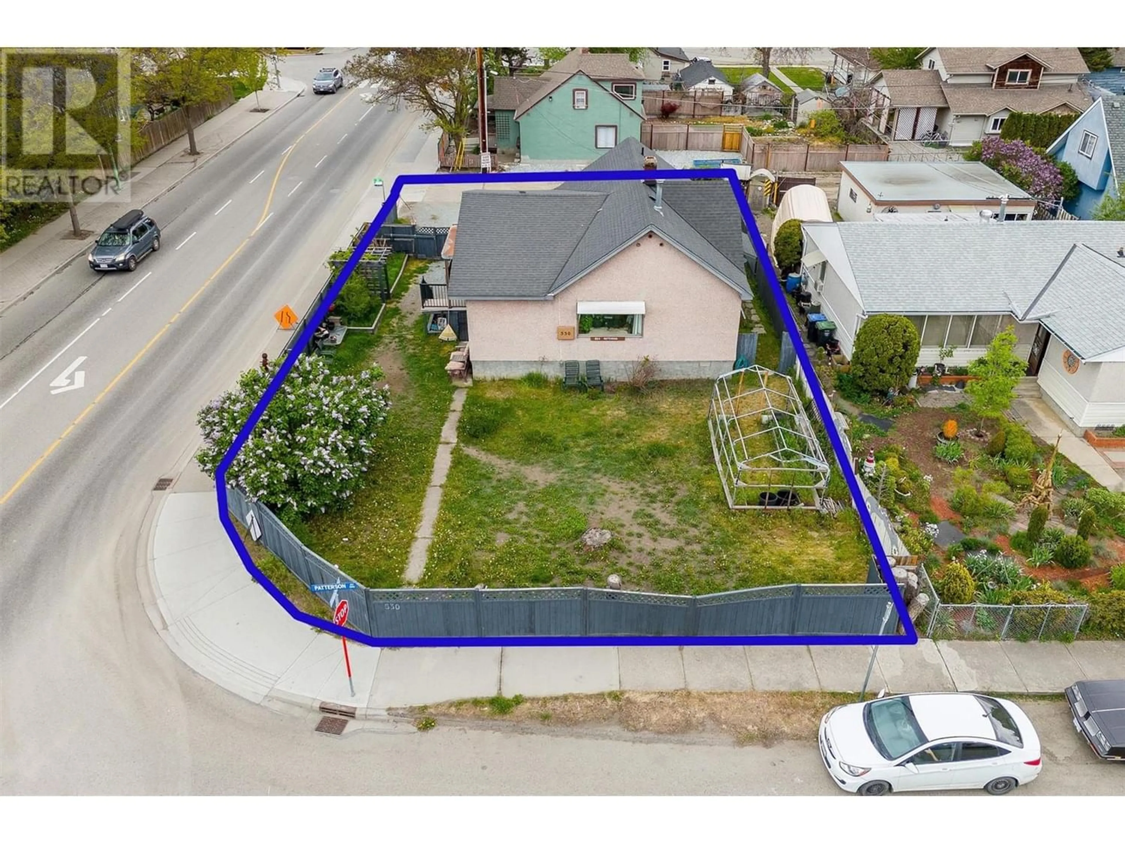 Frontside or backside of a home, the fenced backyard for 530 Patterson Avenue, Kelowna British Columbia V1Y5C6