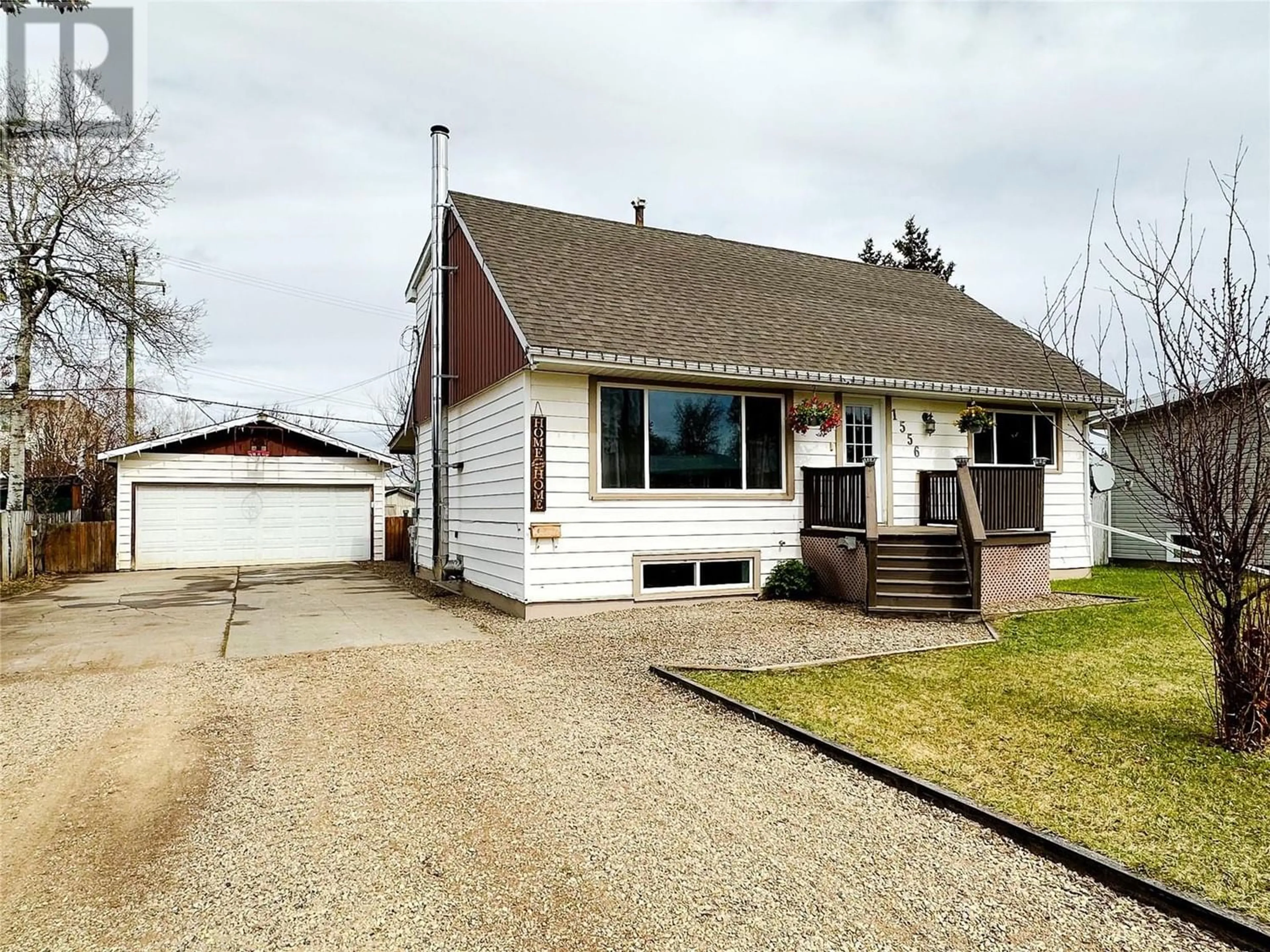 Frontside or backside of a home for 1556 109 Avenue, Dawson Creek British Columbia V1G2V2
