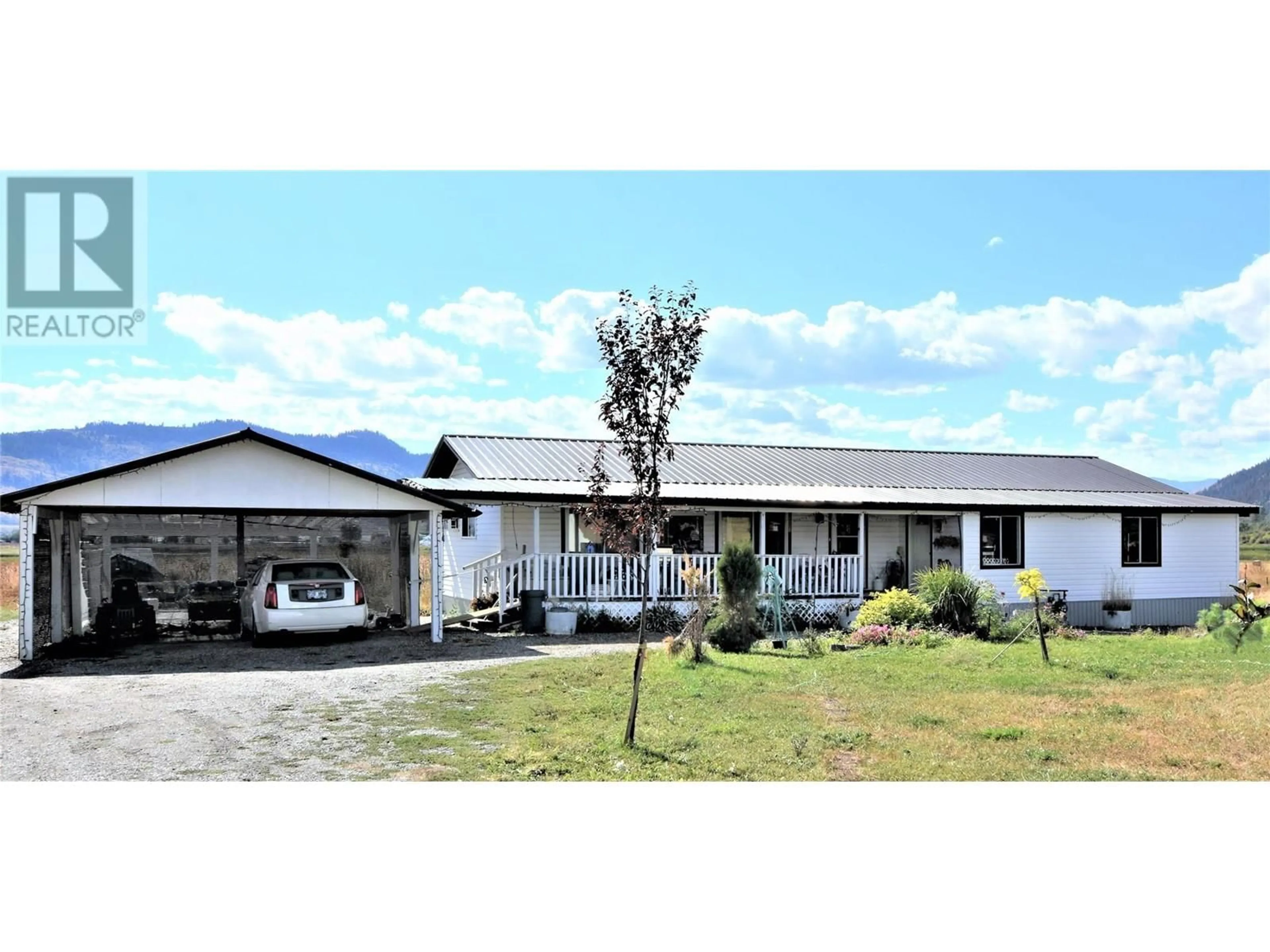 A pic from outside/outdoor area/front of a property/back of a property/a pic from drone, unknown for 12477 WESTSIDE ROAD, Vernon British Columbia V1H1Z3