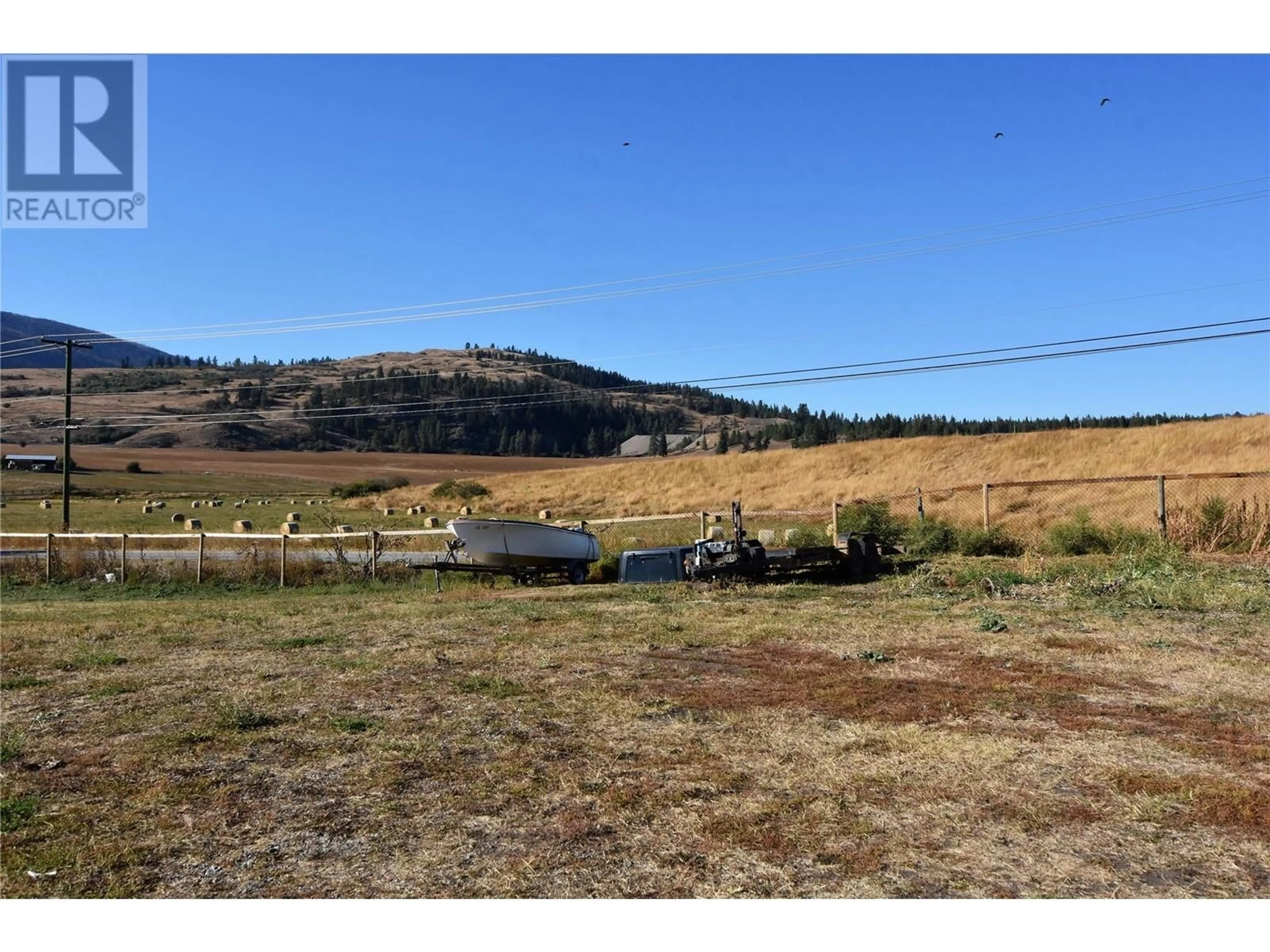 A pic from outside/outdoor area/front of a property/back of a property/a pic from drone, water/lake/river/ocean view for 12477 WESTSIDE ROAD, Vernon British Columbia V1H1Z3