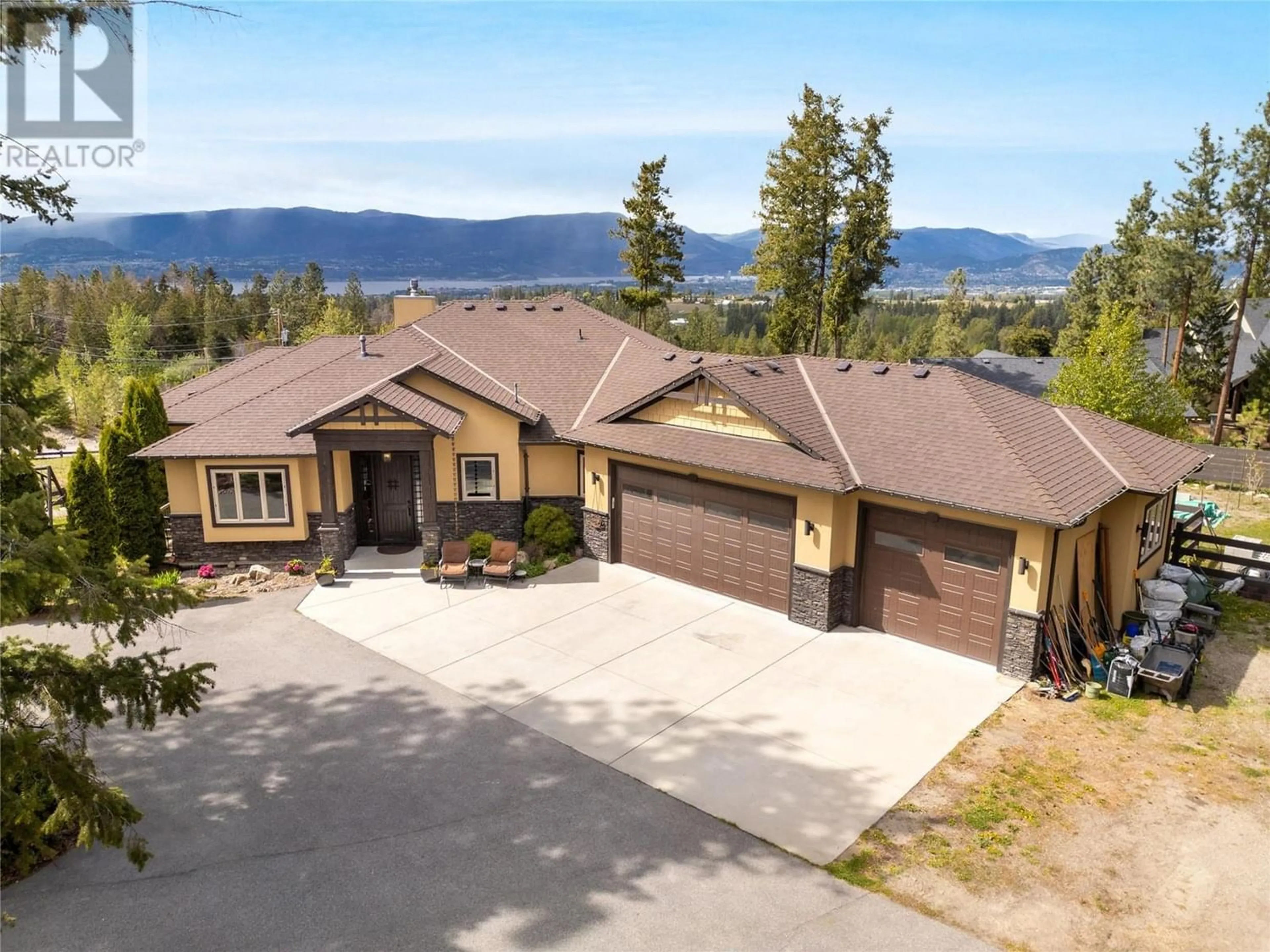 Frontside or backside of a home for 4531 Gaspardone Road, Kelowna British Columbia V1W5A7