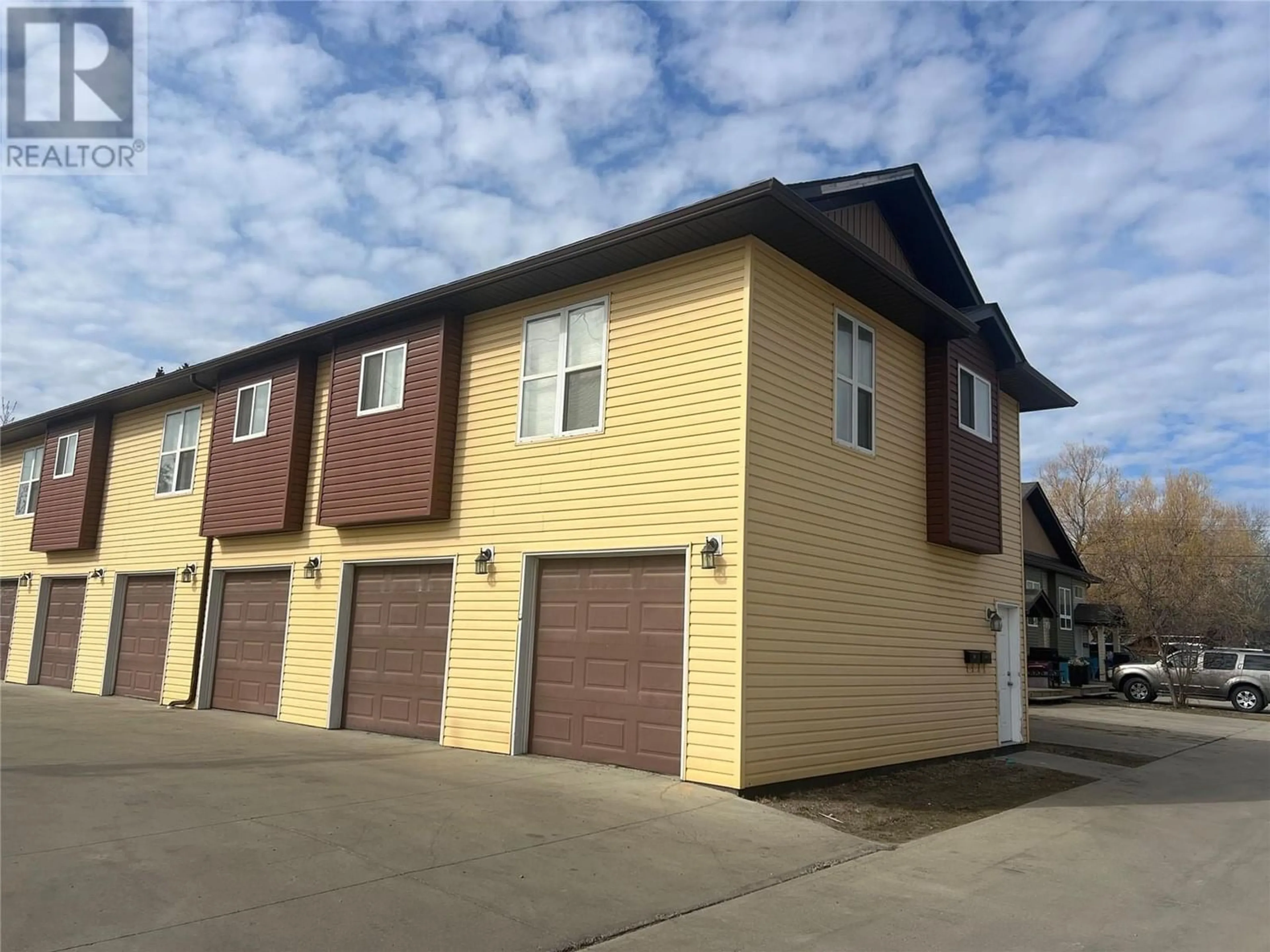 A pic from exterior of the house or condo for 10209 17 Street Unit# 111, Dawson Creek British Columbia V1G4C3