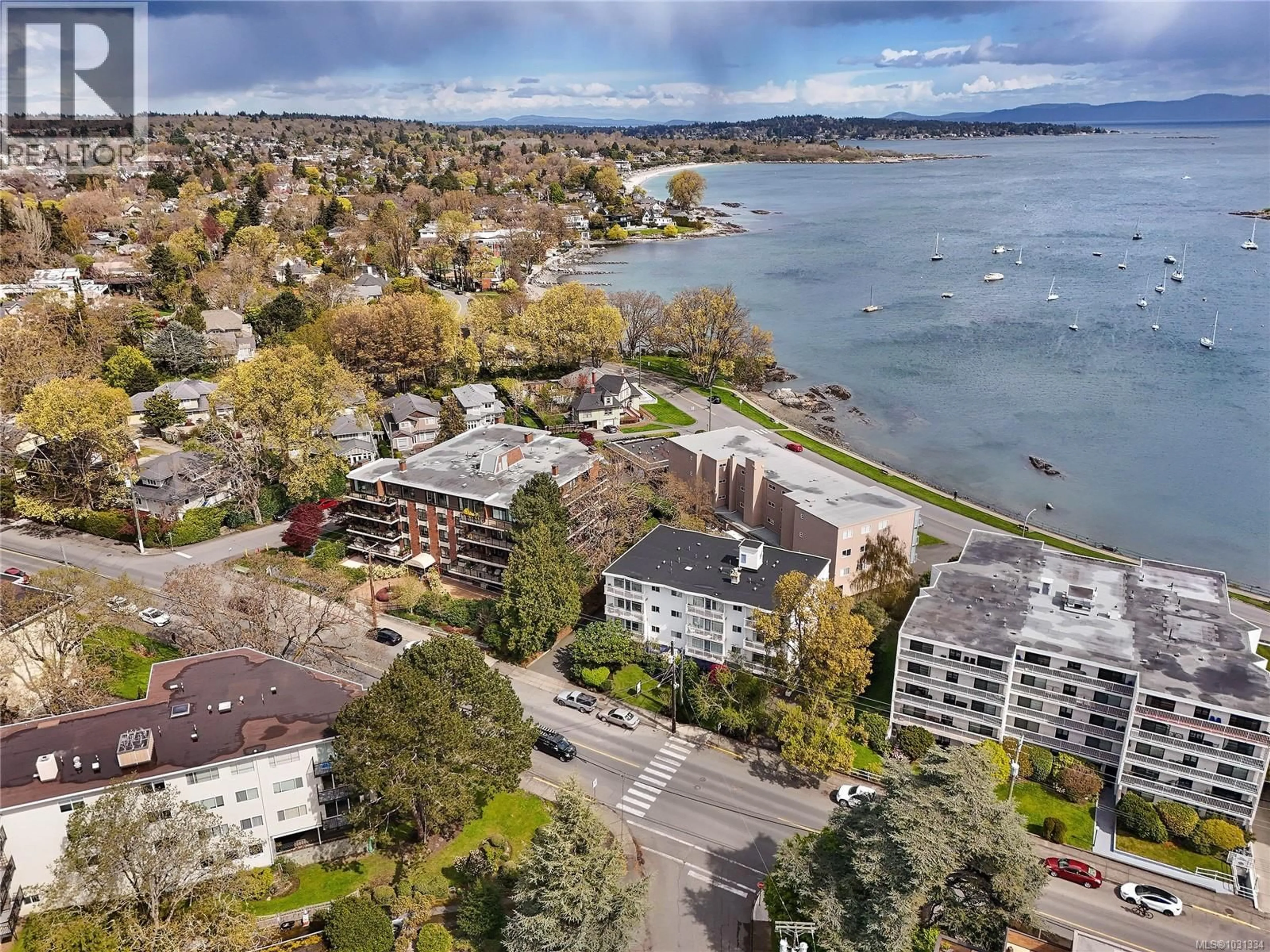 A pic from outside/outdoor area/front of a property/back of a property/a pic from drone, water/lake/river/ocean view for 102 - 1400 NEWPORT AVENUE, Oak Bay British Columbia V8S5K9