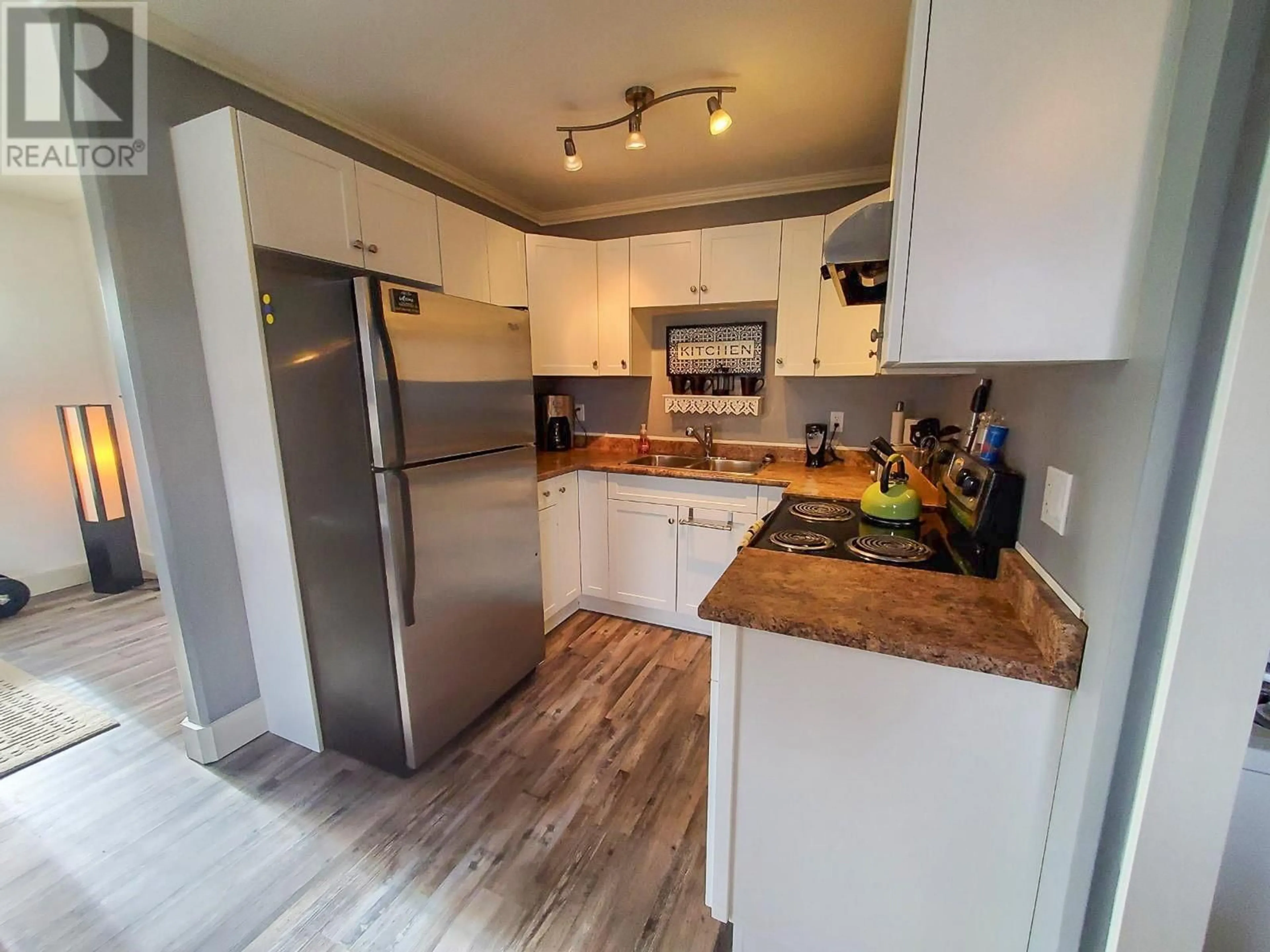 Standard kitchen, wood/laminate floor for 113 - 10209 17 STREET, Dawson Creek British Columbia V1G4C3